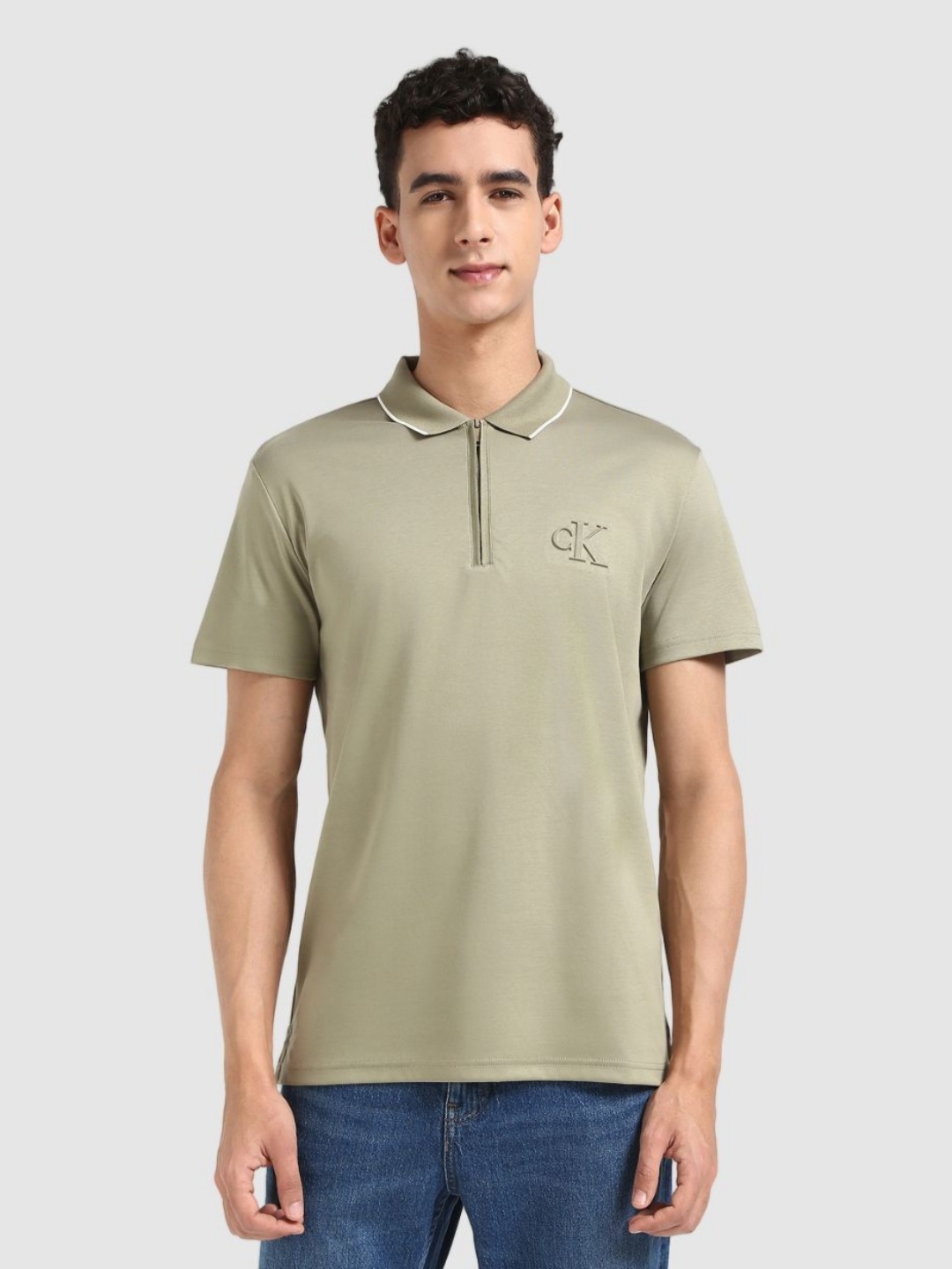 

Calvin Klein Jeans Men Solid Polo Collar Cotton T-shirt, Olive