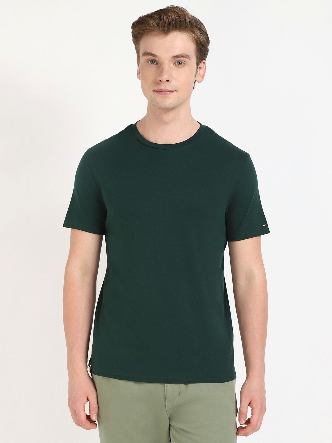 

Tommy Hilfiger Men Solid Round Neck Cotton T-shirt, Teal