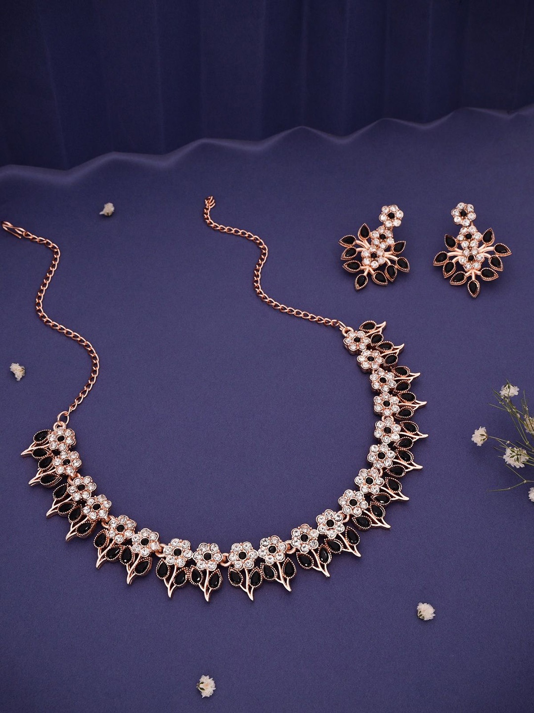 

Lyriss Gold-Plated American Diamond Studded Necklaces And Earrings