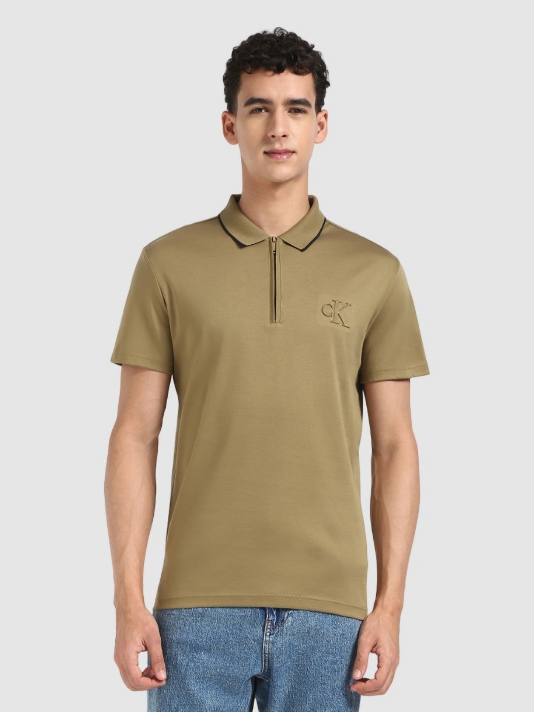 

Calvin Klein Jeans Men Solid Polo Collar Cotton T-shirt, Olive
