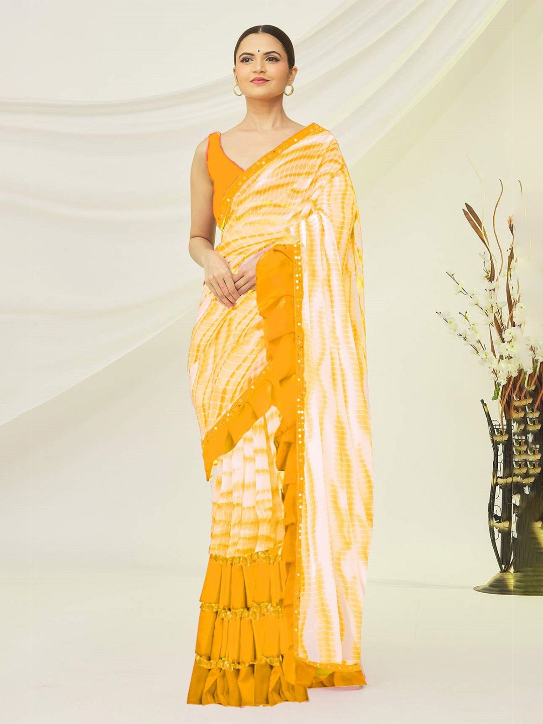 

Moda Rapido Tie and Dye Sequinned Pure Georgette Ruffles Saree, Yellow