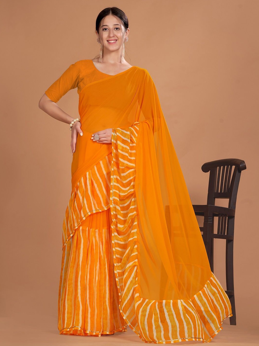 

Moda Rapido Pure Georgette Leheriya Saree, Mustard