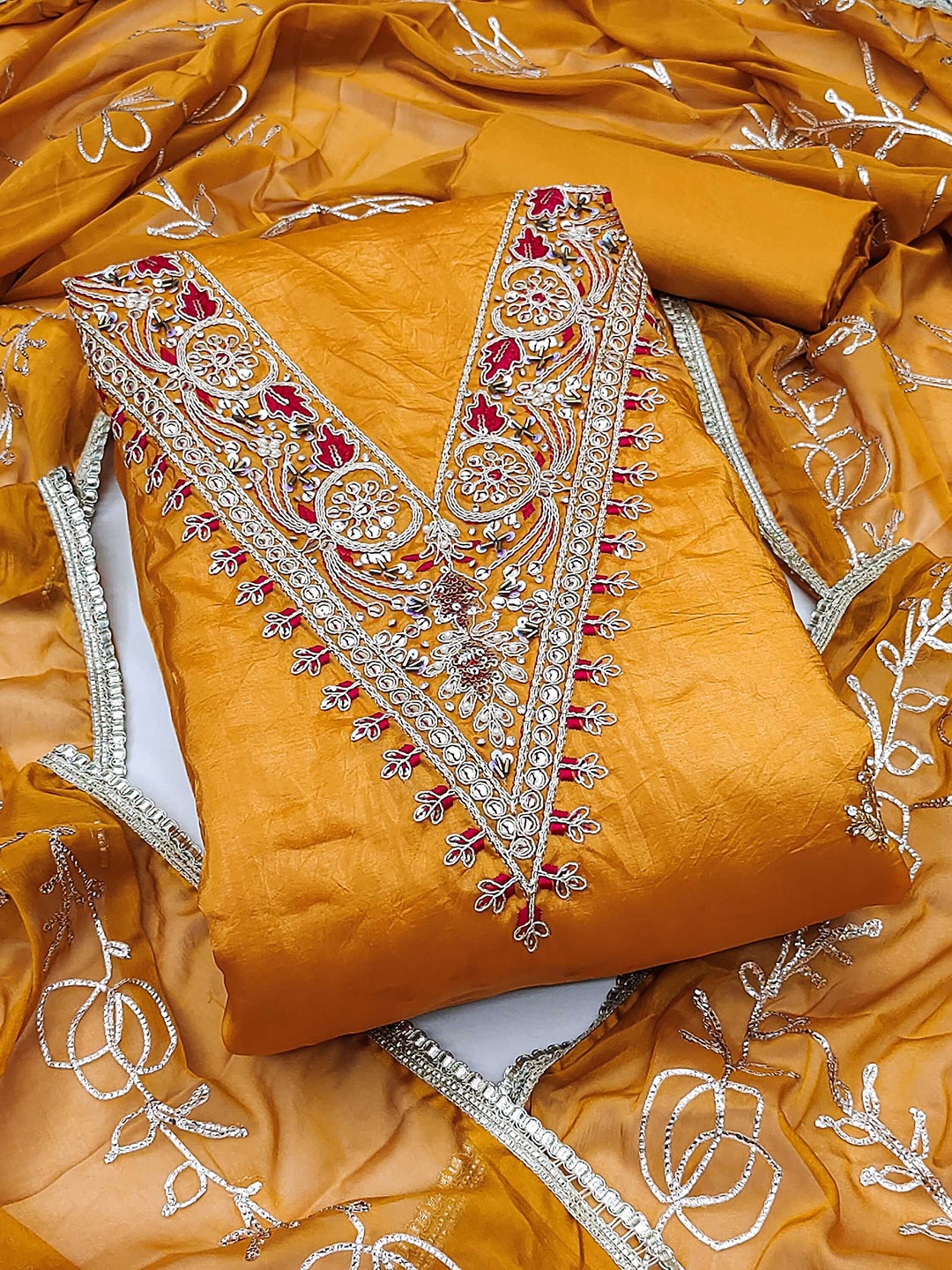 

SAINOOR Beads And Stones Embellished Pure Silk Semi-Stitched Dress Material, Orange