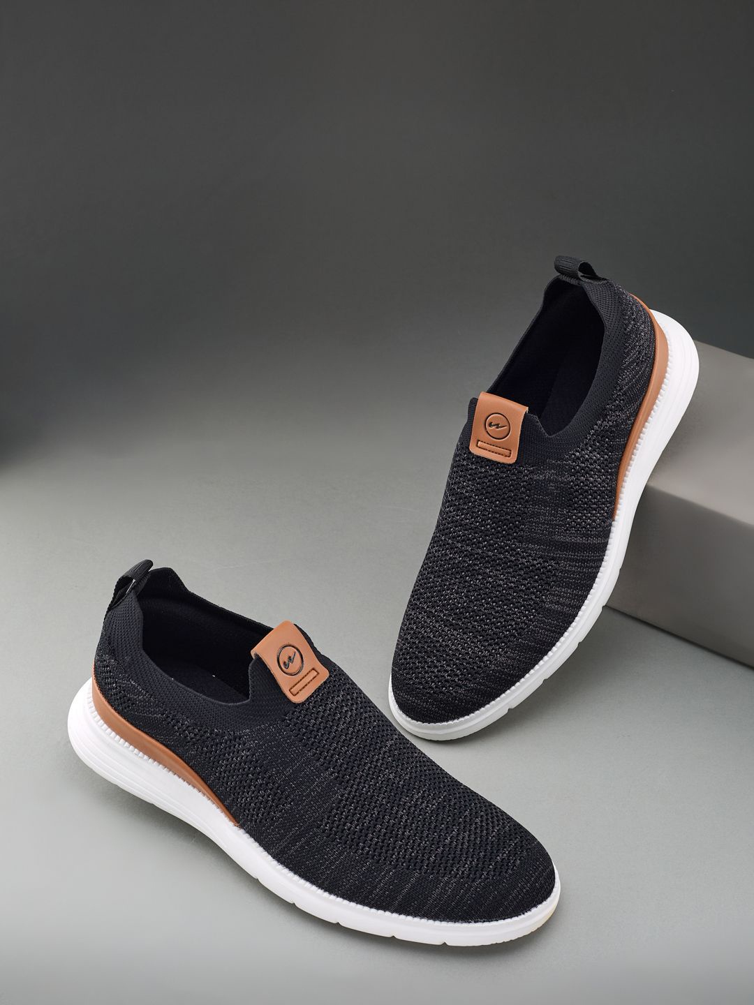 

Campus Men Woven Design Slip-On Sneakers, Black