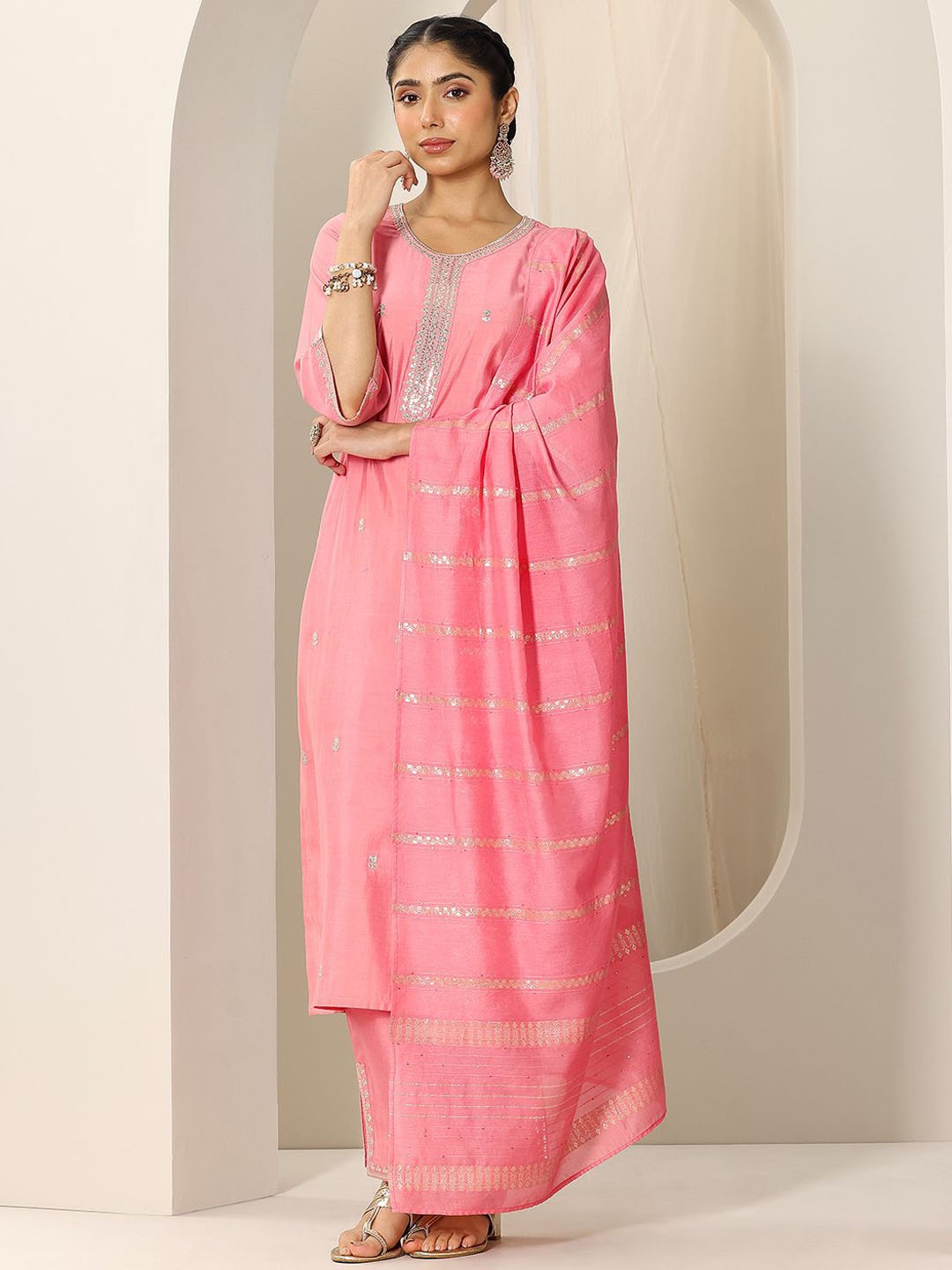 

Libas Floral Embroidered Round Neck Sequinned Kurta With Trousers And Dupatta, Peach