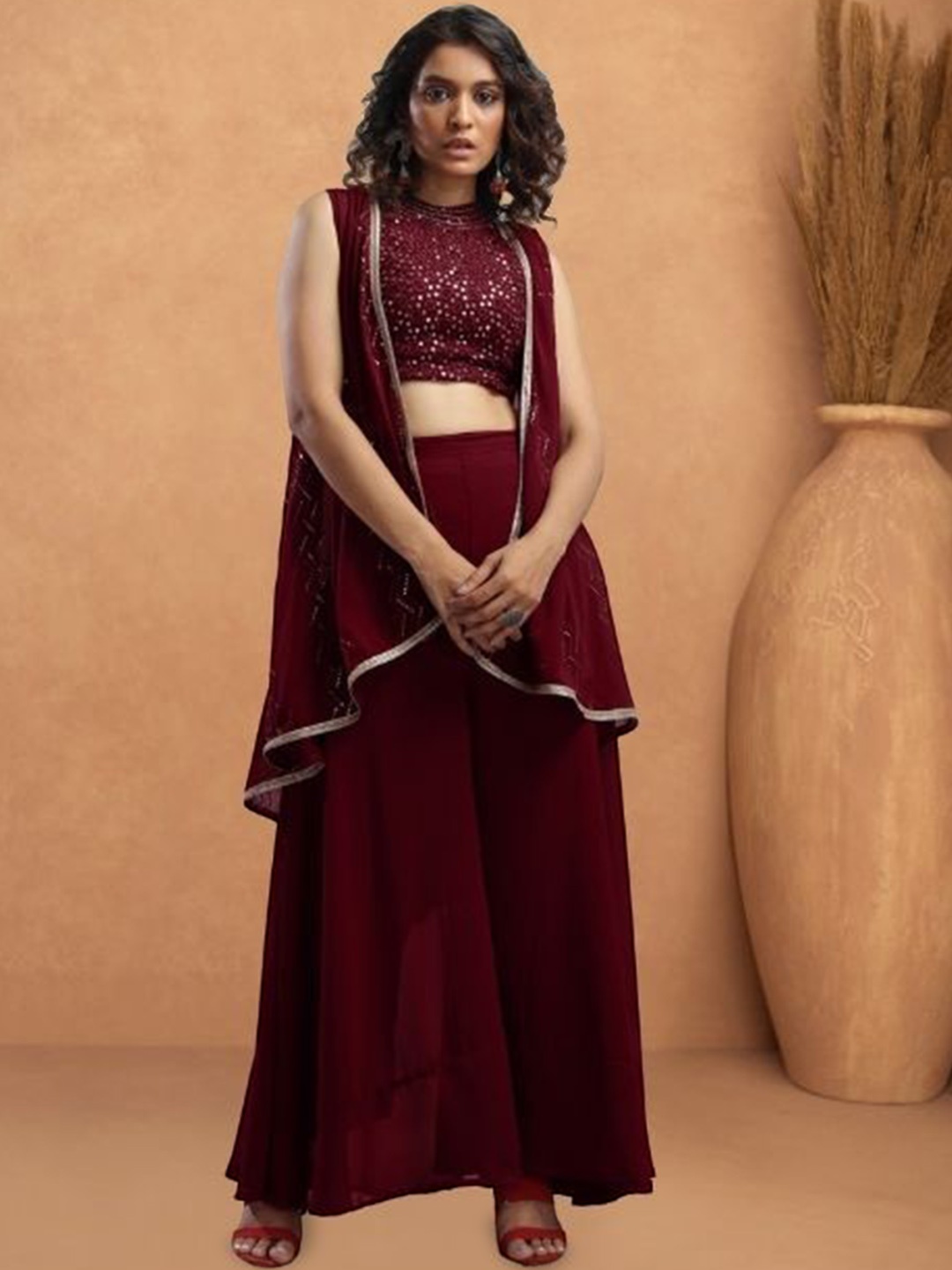 

PARROT CREATION Sweta Embroidered Halter Neck Georgette Crop Top With Palazzos & Shrug, Maroon