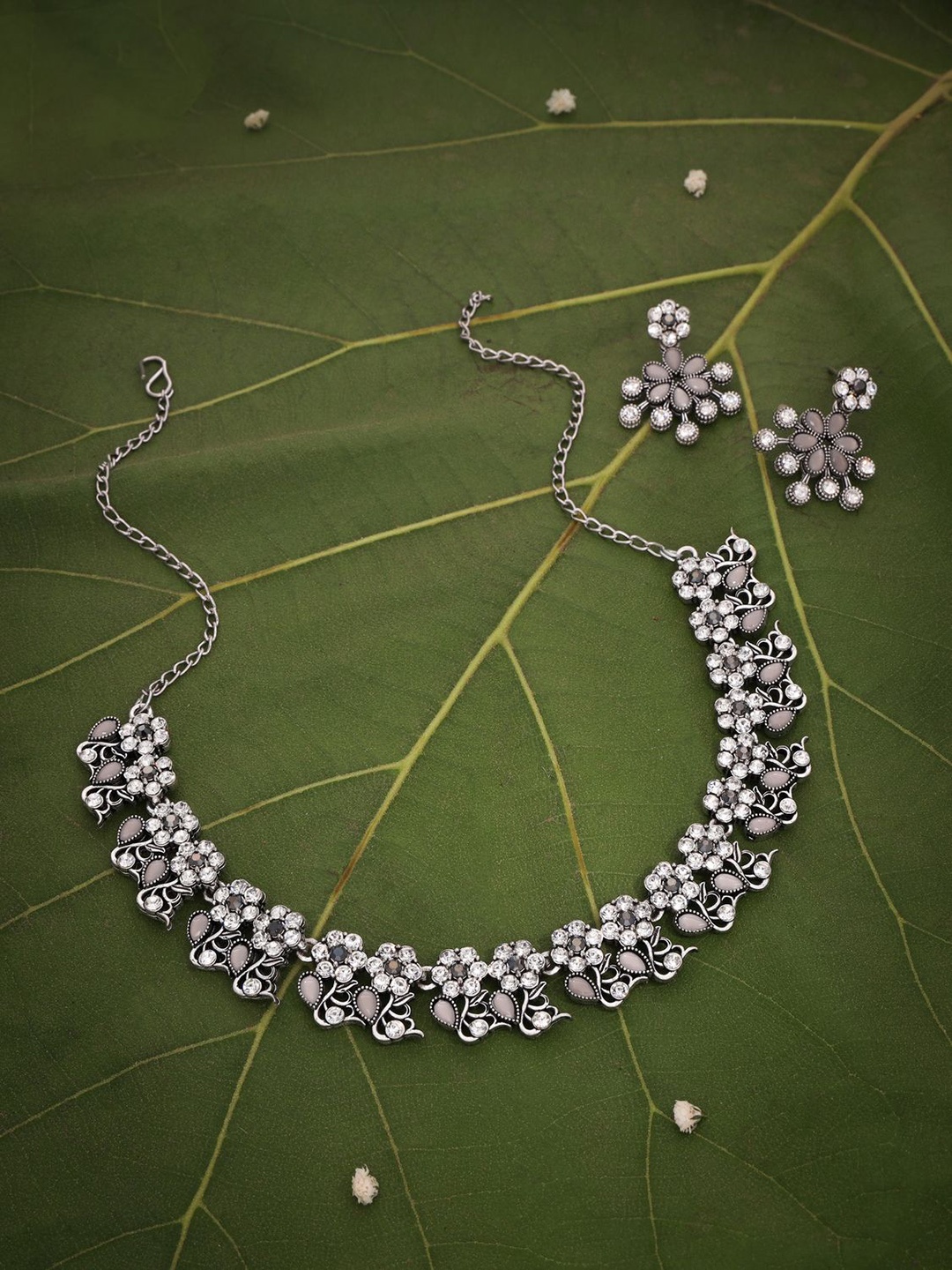 

Lyriss Silver-Plated American Diamond Studded Jewellery Set