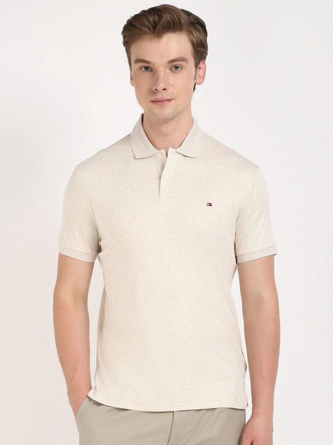 

Tommy Hilfiger Men Solid Polo Collar Cotton T-shirt, Beige