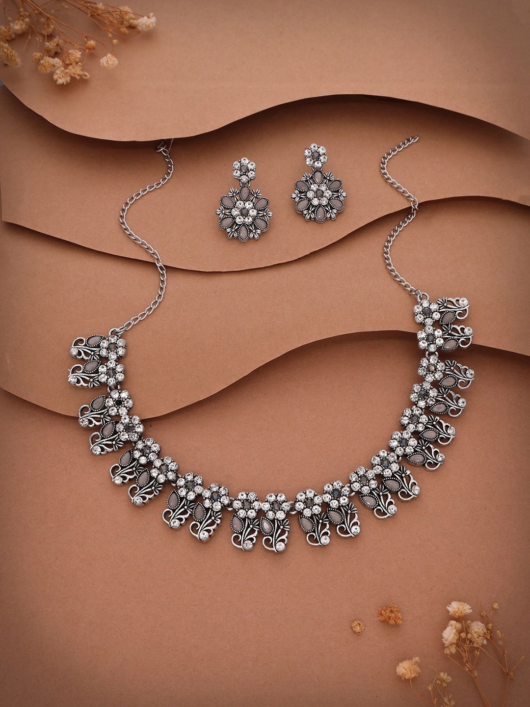 

Lyriss Silver-Plated American Diamond Studded Jewellery Set