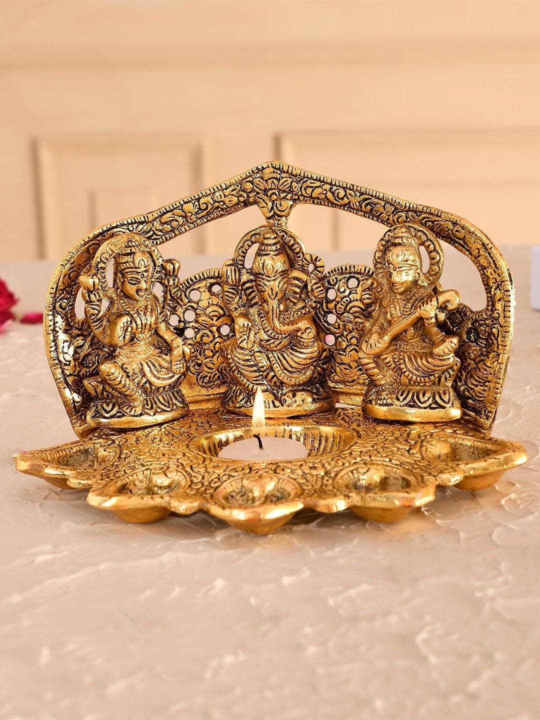 

CRAFTAM Gold-Toned Laxmi Ganesh Saraswati Darbar with five Diya Religious Idol Showpiece