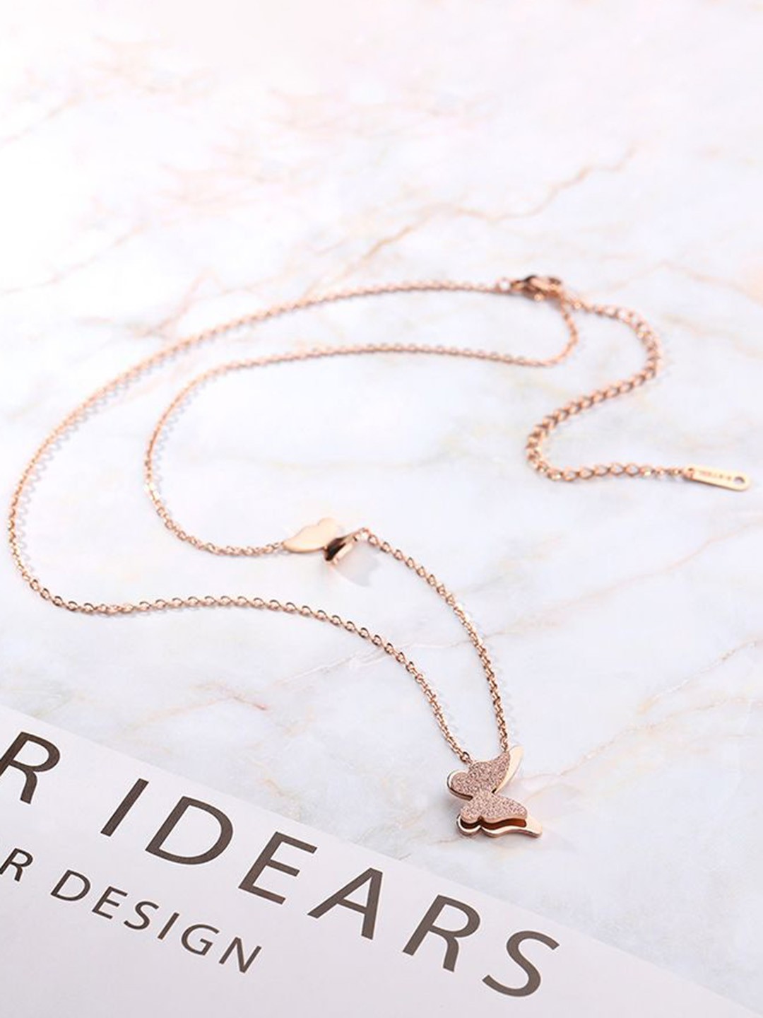 

DressBerry Rose Gold-Plated Butterfly Shaped Pendant With Chain