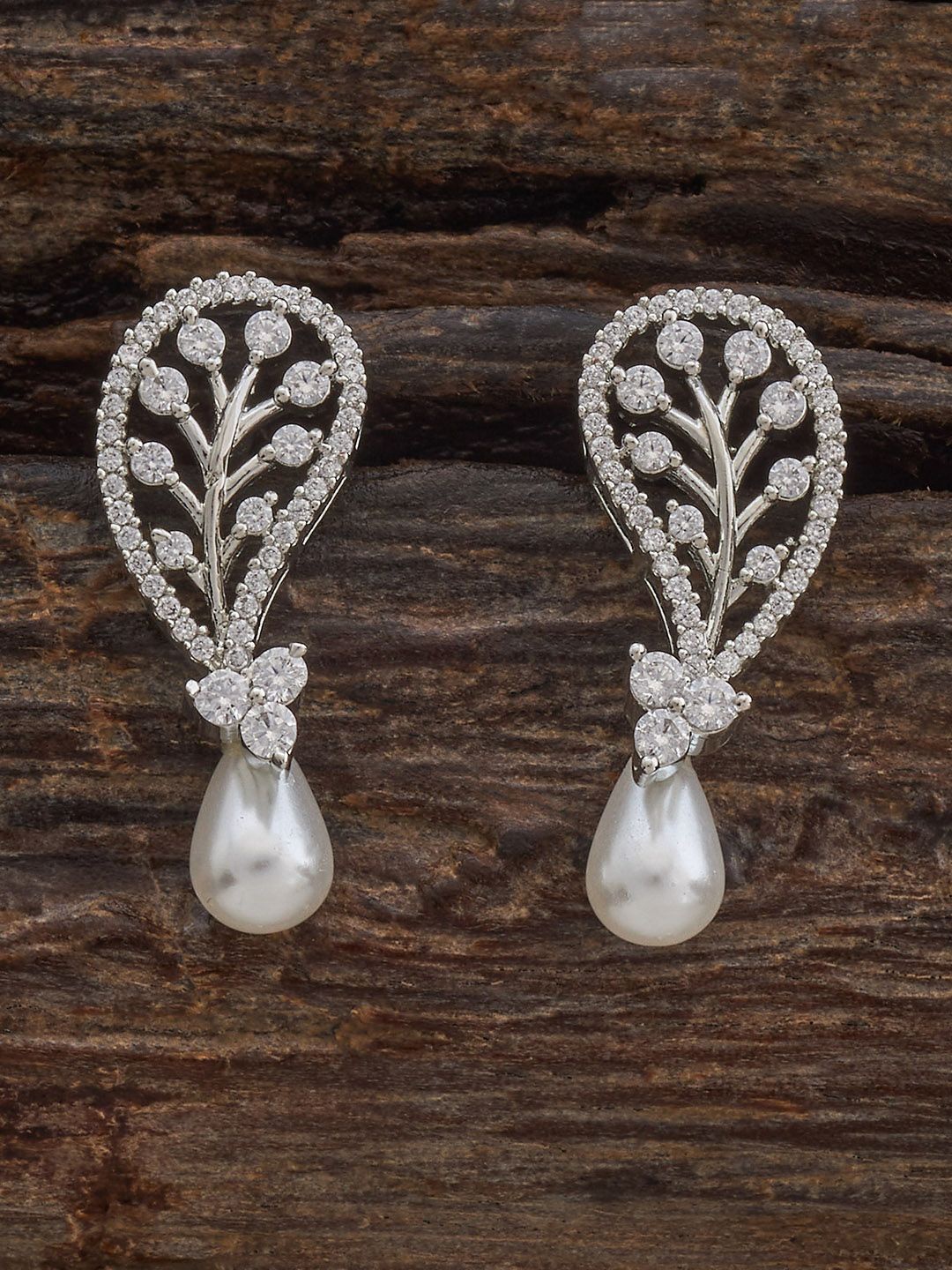 

Kushal's Fashion Jewellery Rhodium-Plated Zircon Studded Leaf Shaped Studs Earrings, Silver