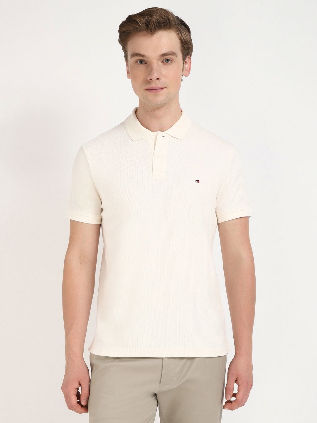 

Tommy Hilfiger Men Solid Polo Collar Cotton T-shirt, Off white