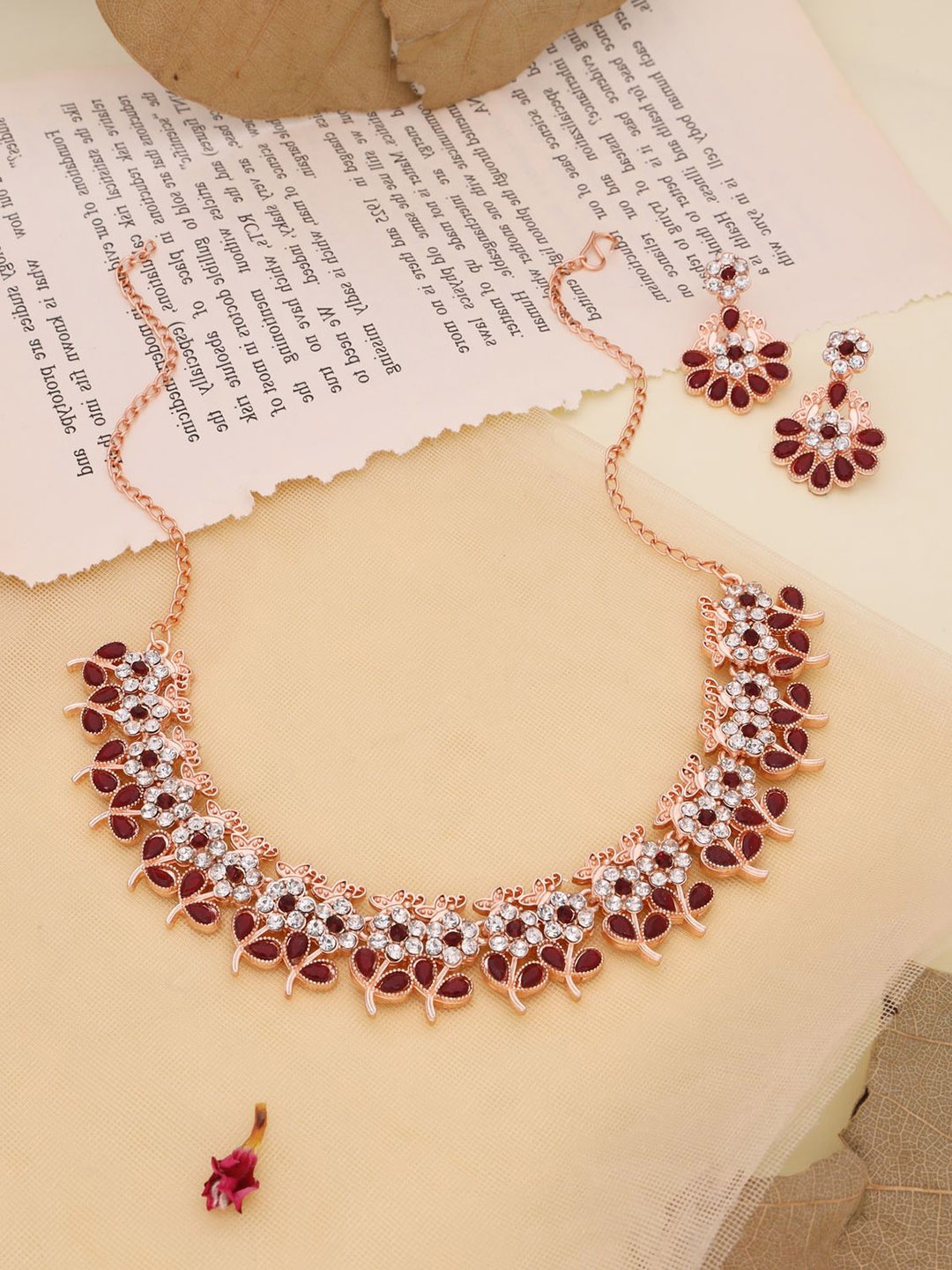 

Lyriss Gold-Plated American Diamond Studded Necklaces And Earrings