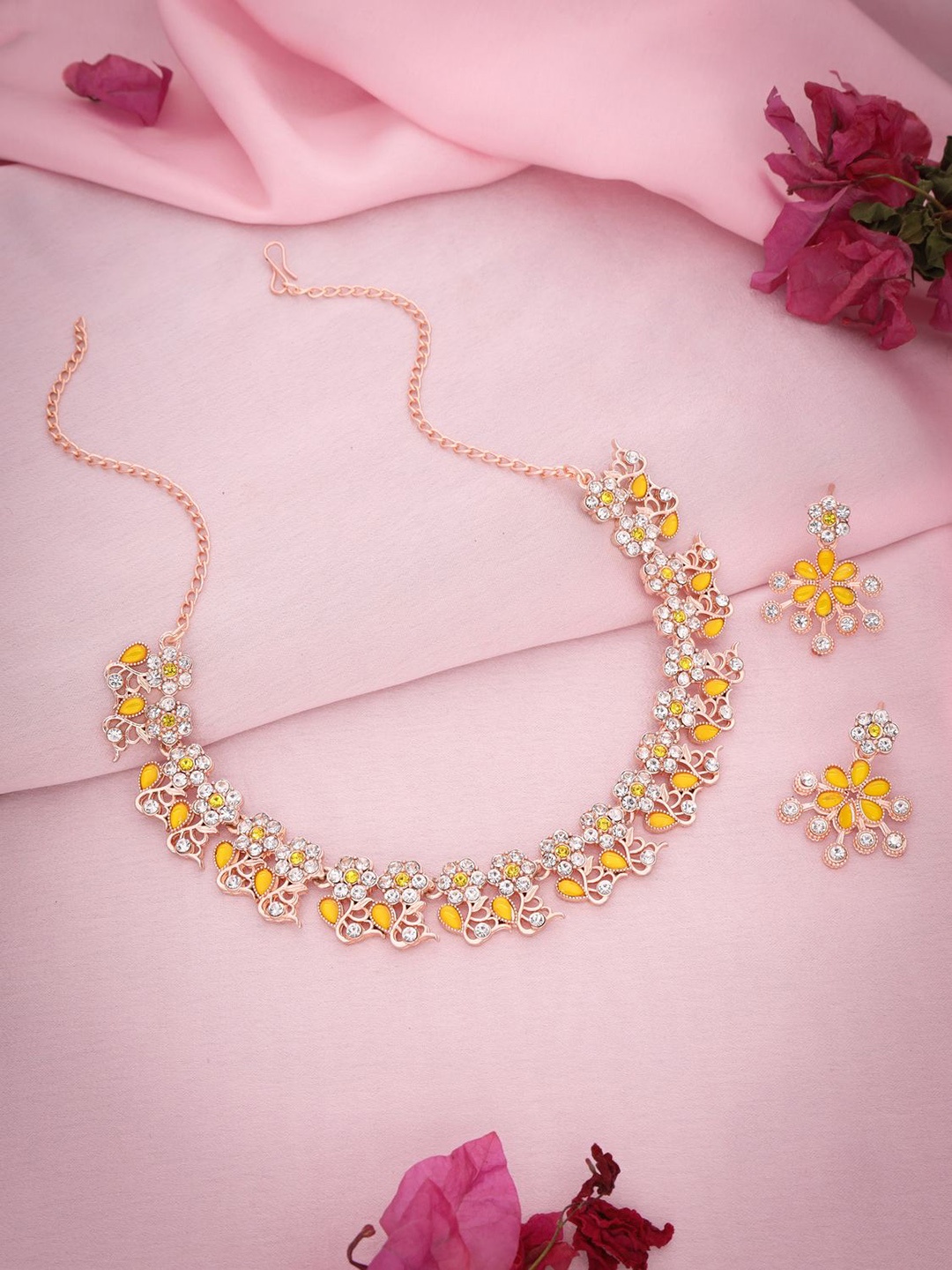

Lyriss Gold-Plated American Diamond Studded Necklaces And Earrings