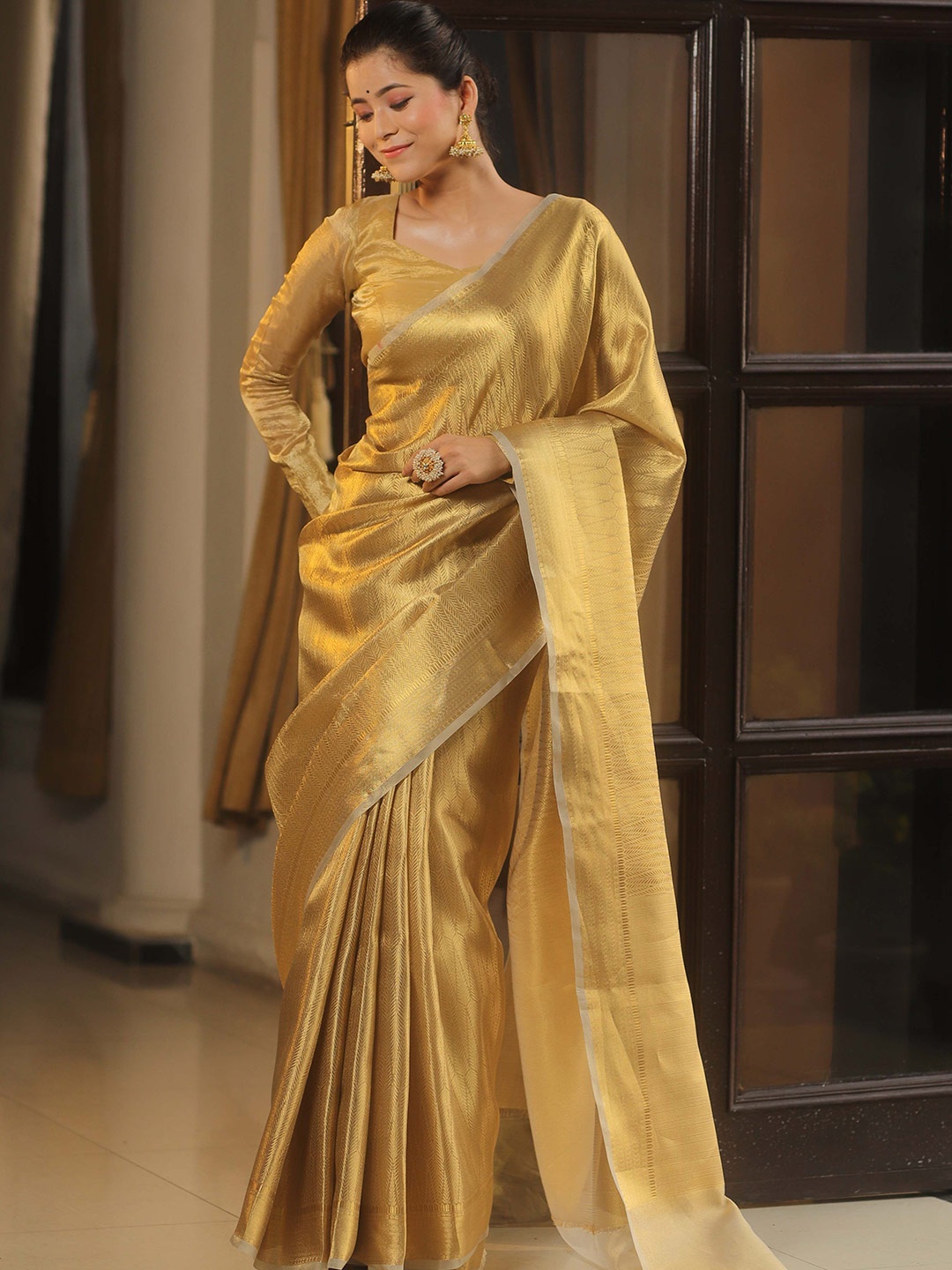 

Banarasee Woven Design Zari Tissue Banarasi Saree, Gold
