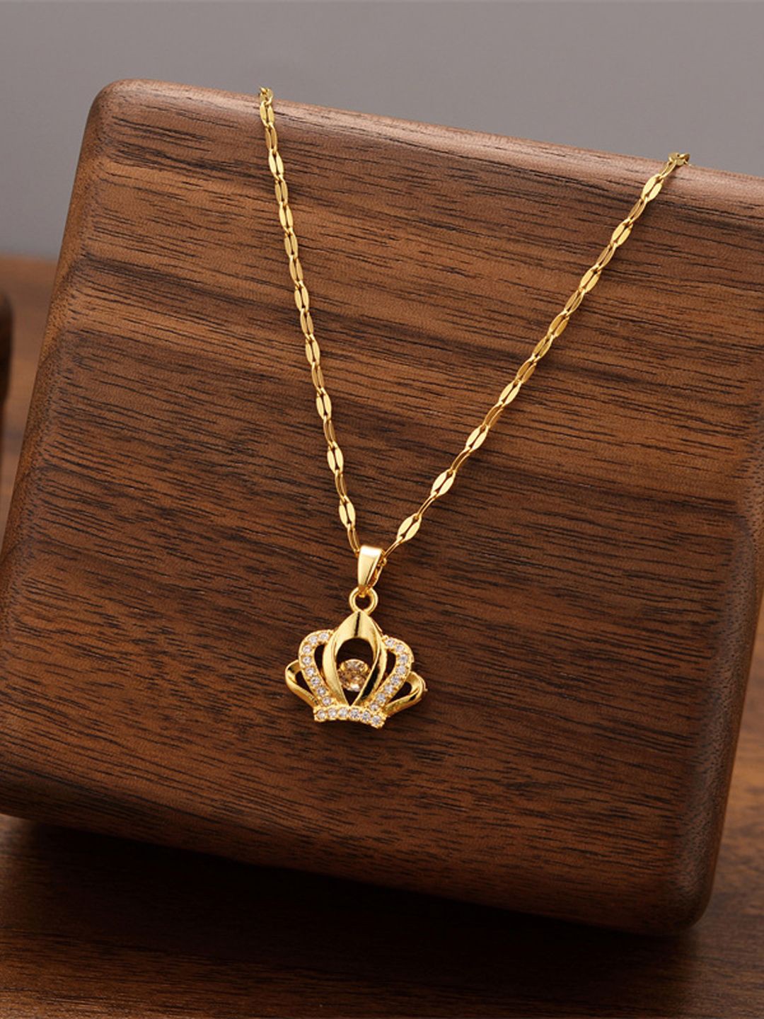 

BEYTER Stainless Steel American Diamond Studded Queen Style Pendant With Chain, Gold