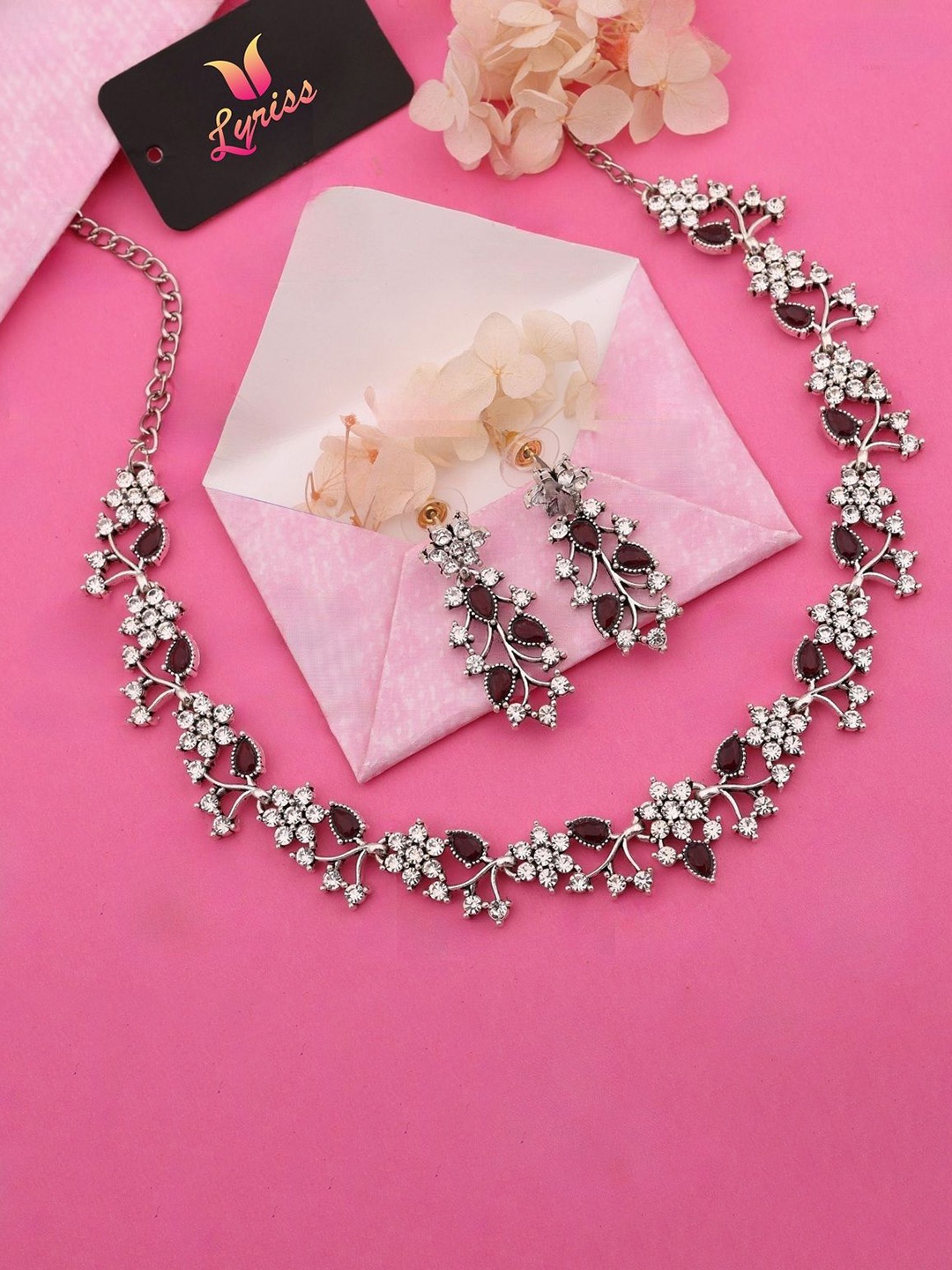 

Lyriss Silver-Plated American Diamond Studded Jewellery Set