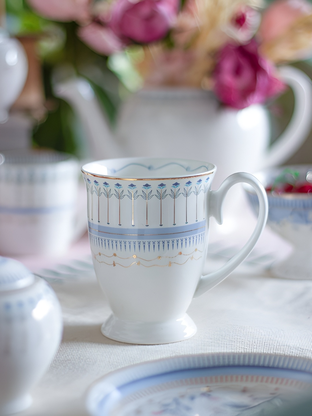 

The Wishing Chair White & Blue Floral Printed Ceramic Glossy Mugs Set of Cups and Mugs