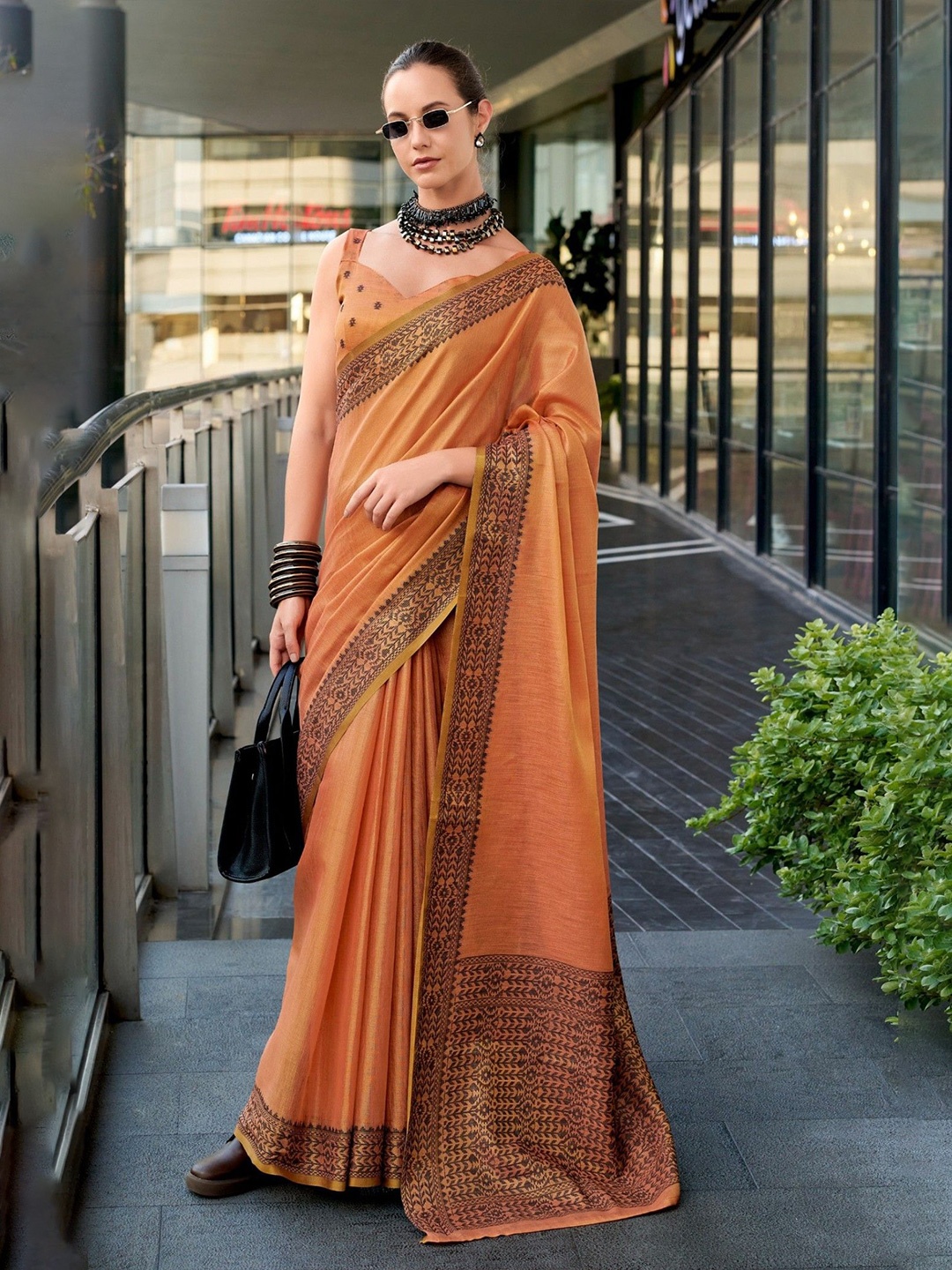 

MySilkLove Tiget Orange Linen Tissue Silk Saree
