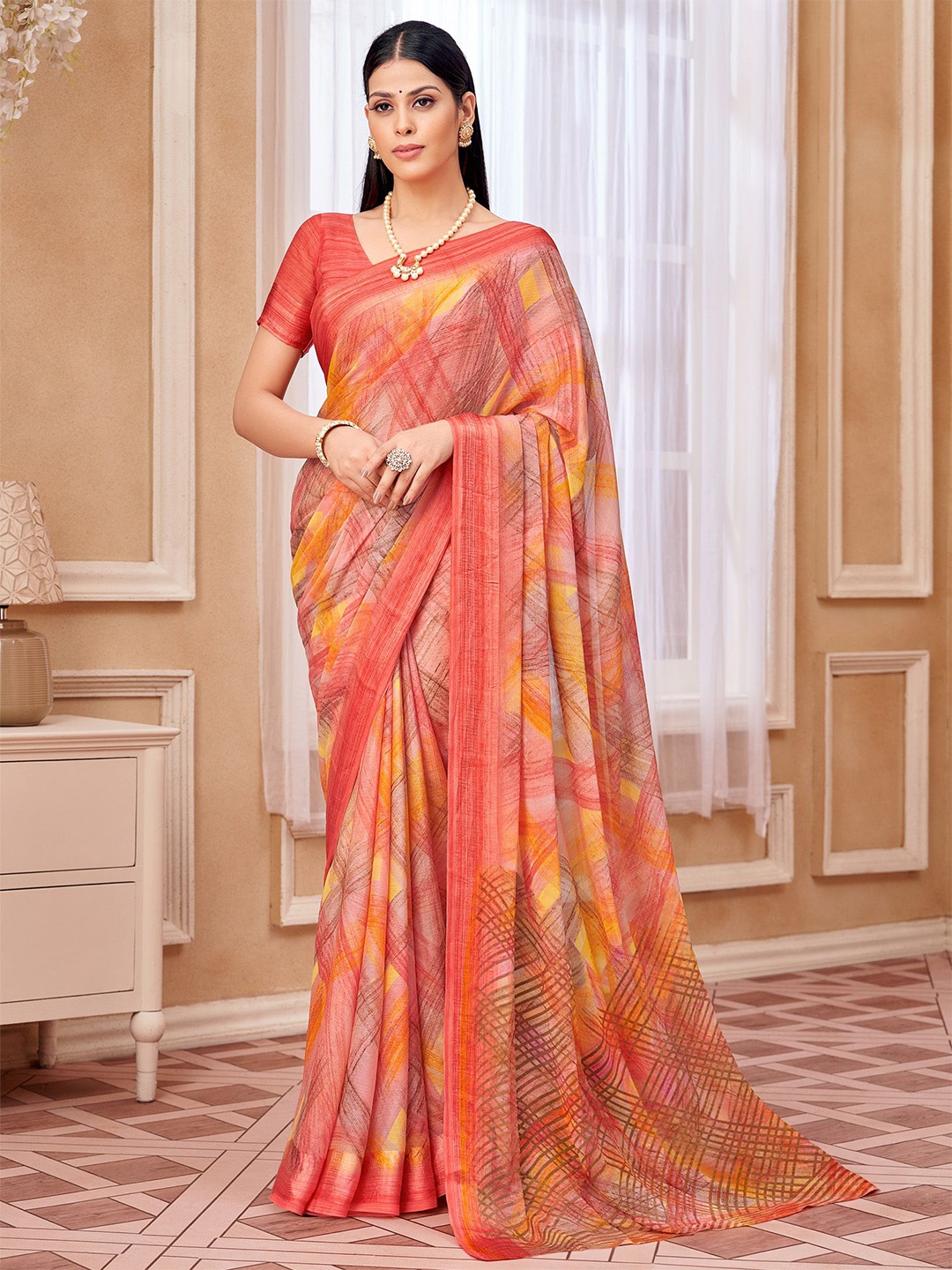 

Mitera Geometric Printed Bagru Saree with an unstitched blouse piece, Multi
