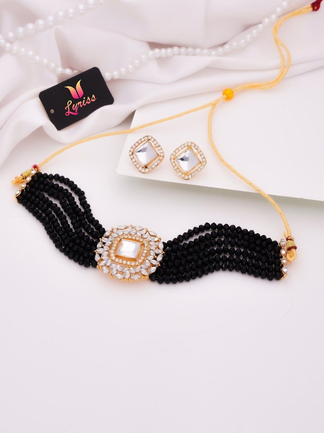 

Anouk Gold-Plated American Diamond Studded Jewellery Set