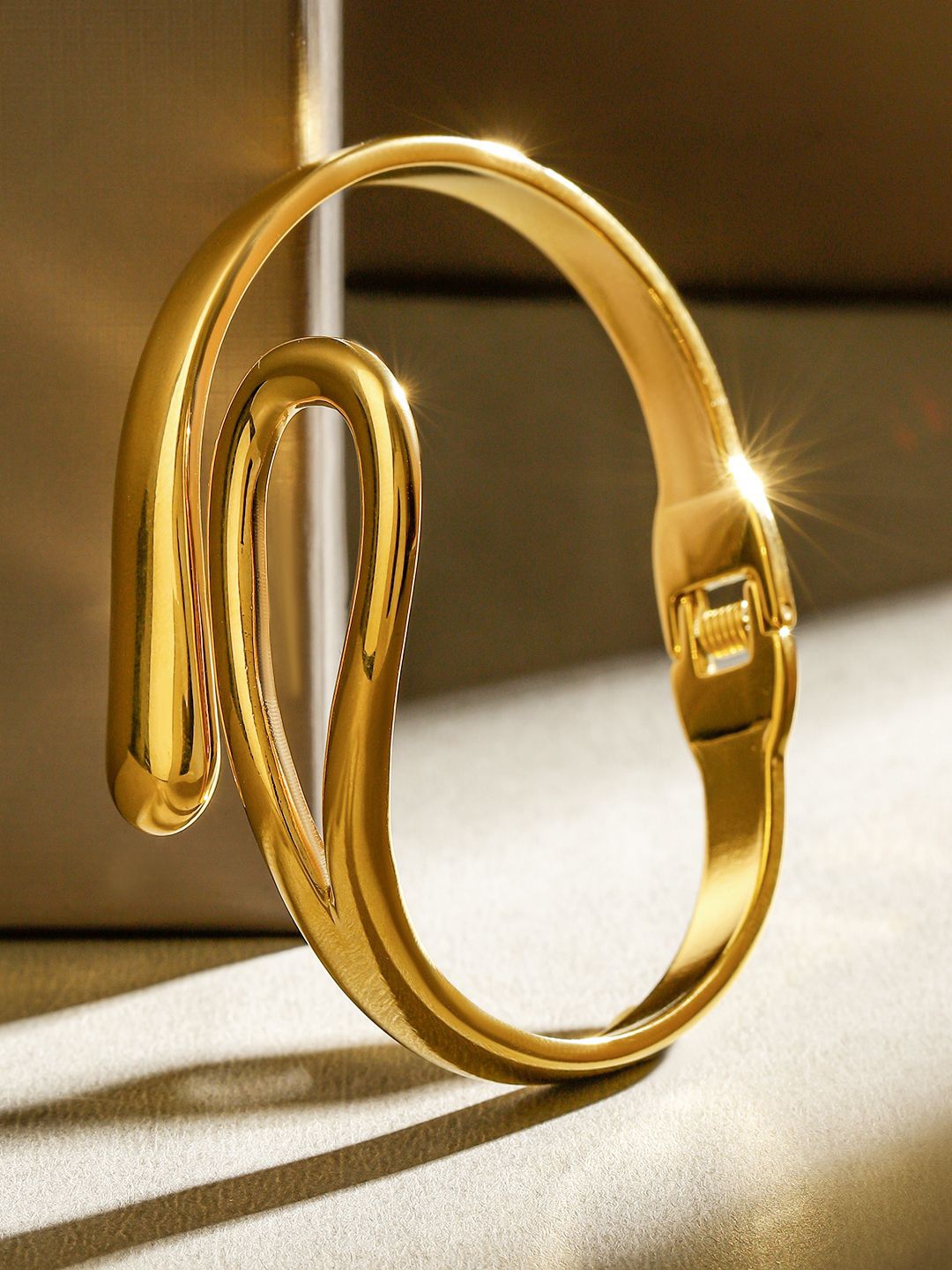 

Rubans Voguish Women Handcrafted Gold-Plated Bangle-Style Bracelet
