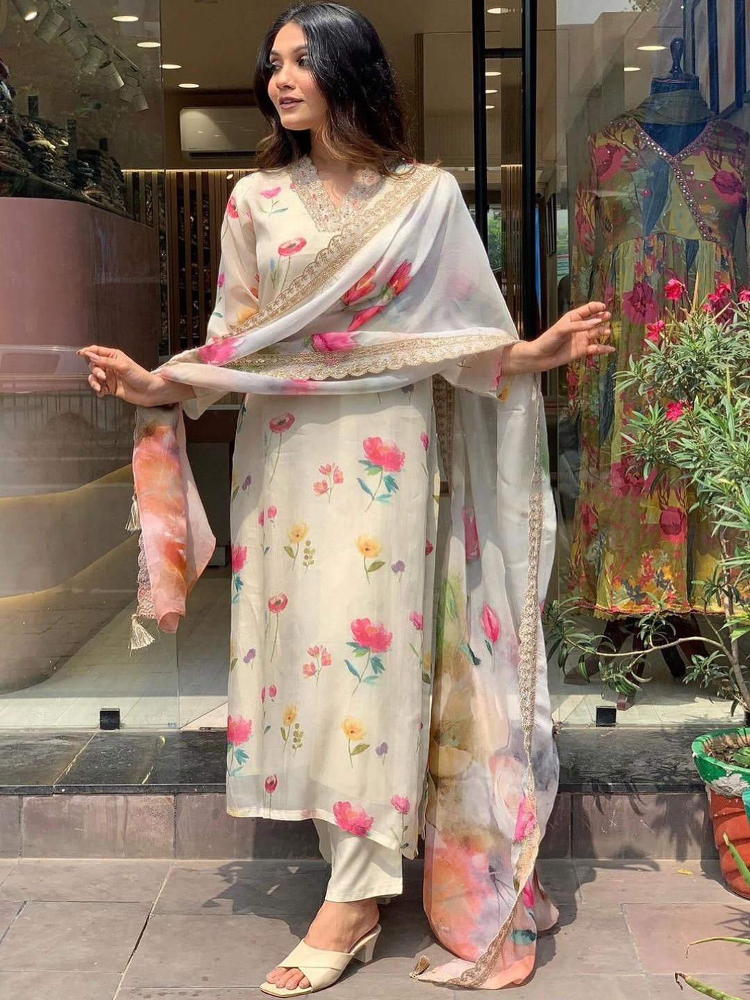 

KALINI Floral Printed V Neck Thread Work Kurta With Trousers & Dupatta, Cream