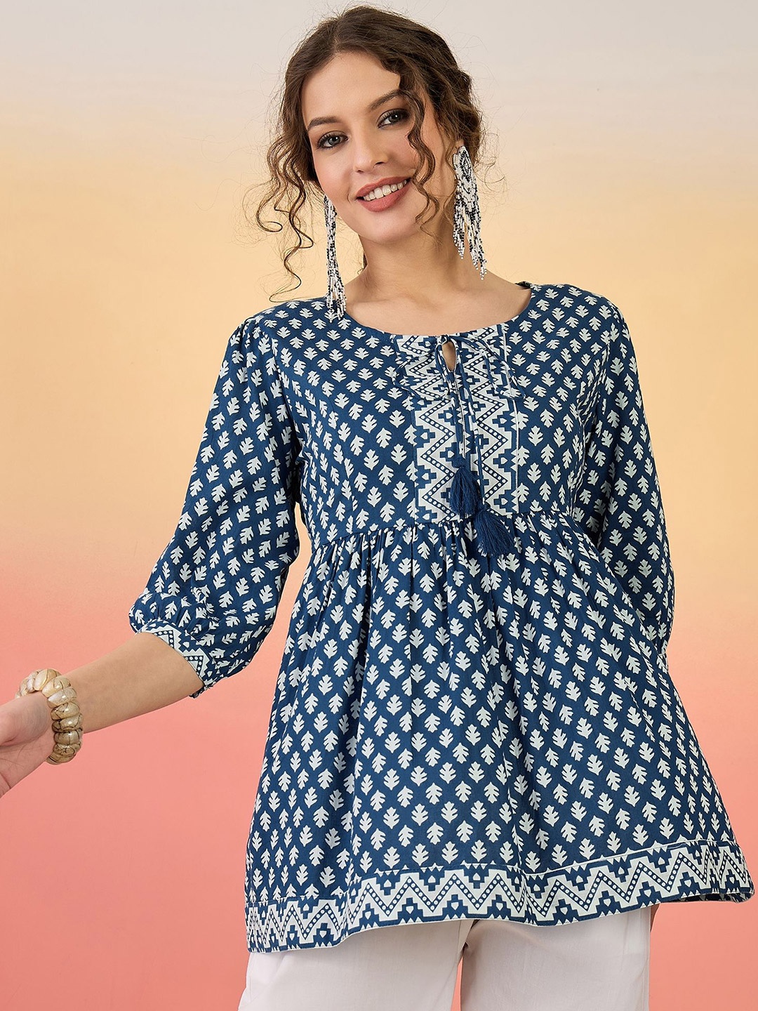 

Sangria Women Floral Printed Peplum Top, Blue