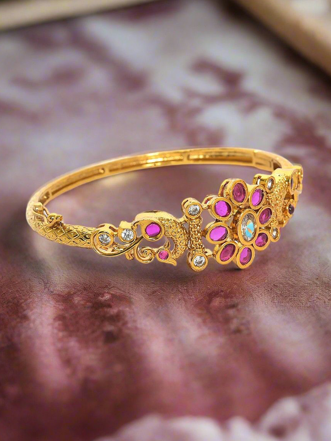 

Anouk Women Brass American Diamond Handcrafted Gold-Plated Bangle-Style Bracelet