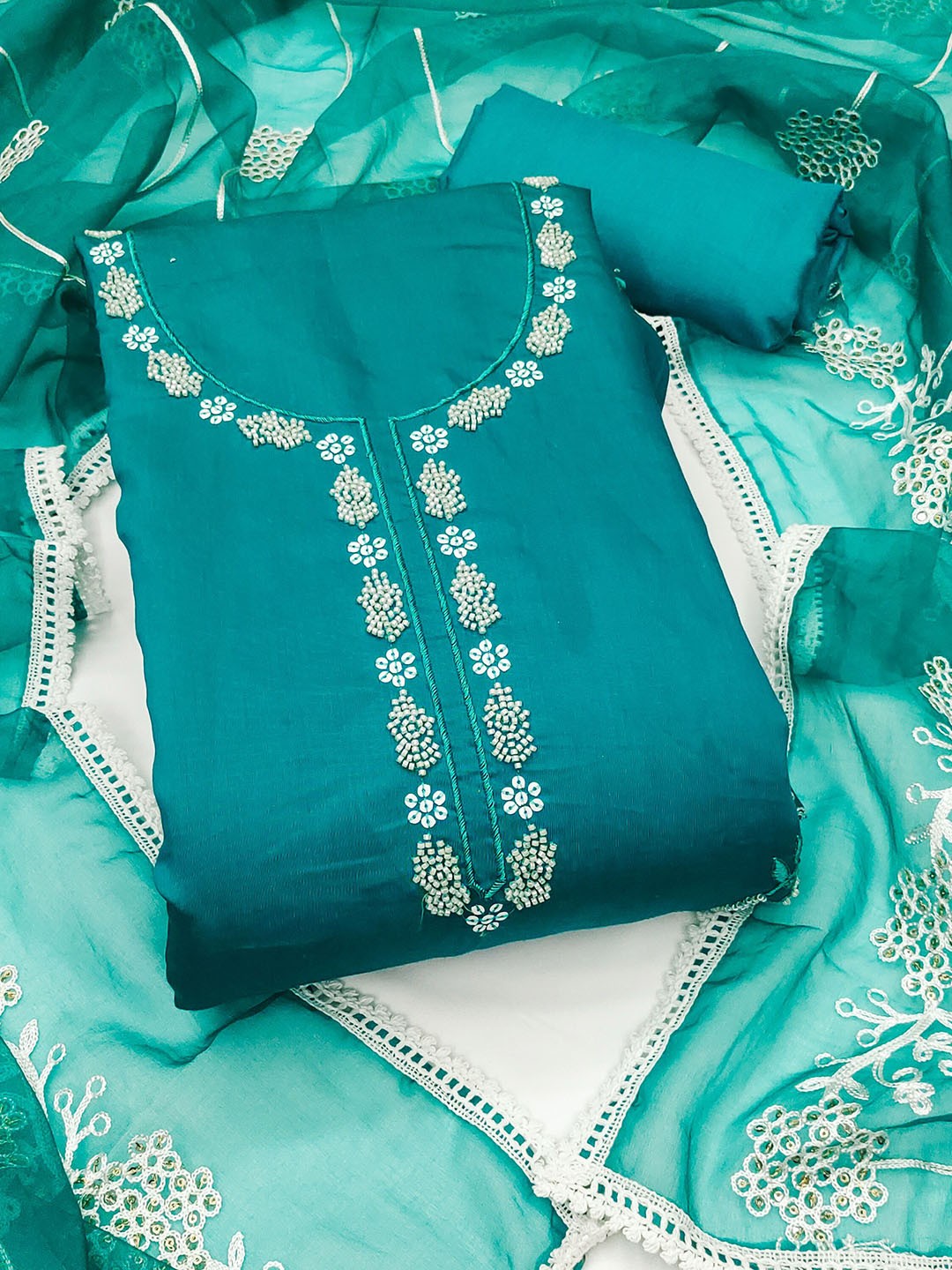 

SAINOOR Embroidered Beads And Stones Pure Cotton Semi-Stitched Dress Material, Blue