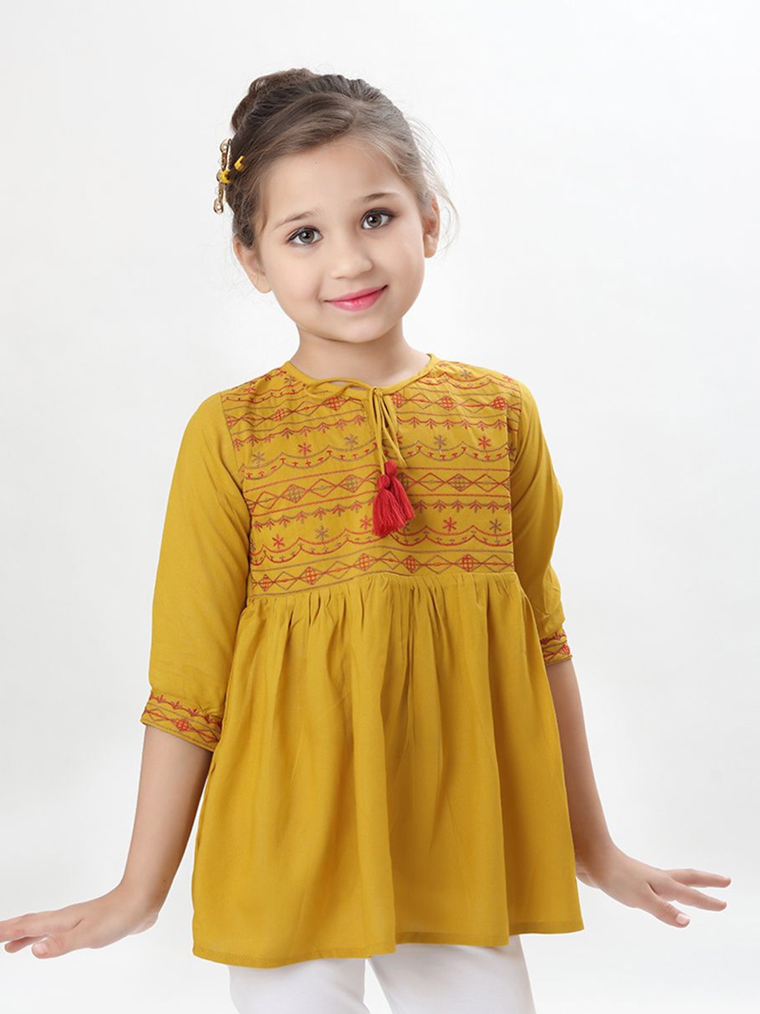 

Miss & Chief Girls Embroidered Empire Top, Mustard