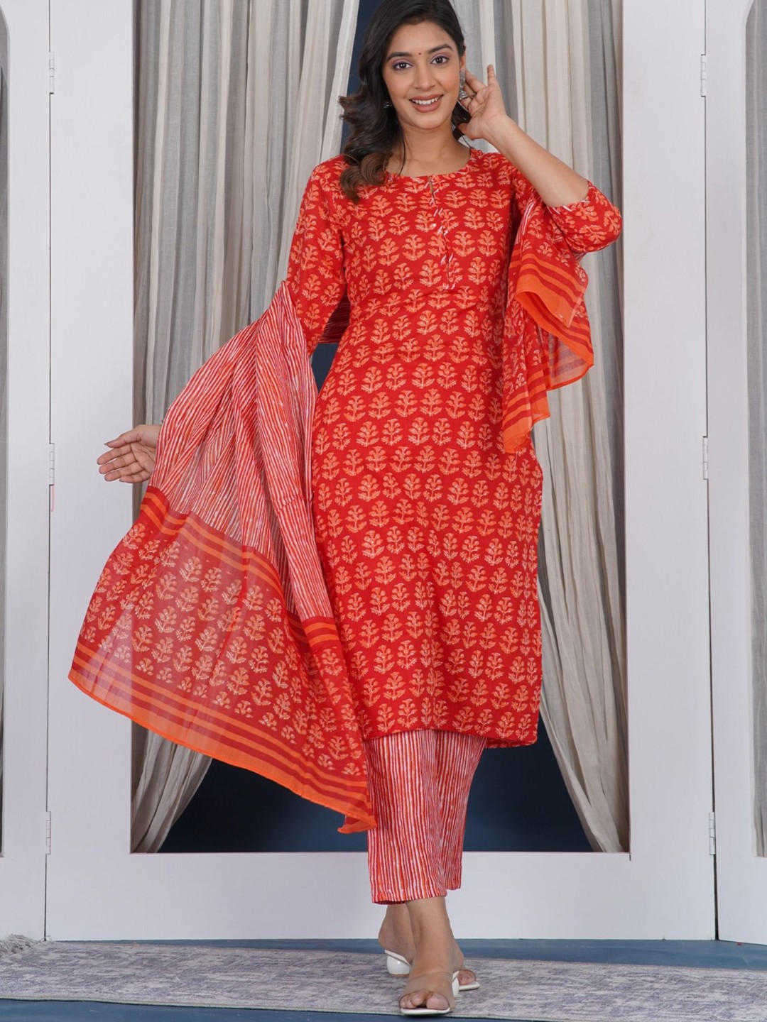 

Prathmikta Floral Printed Keyhole Neck Pure Cotton Straight Kurta With Trousers & Dupatta, Red