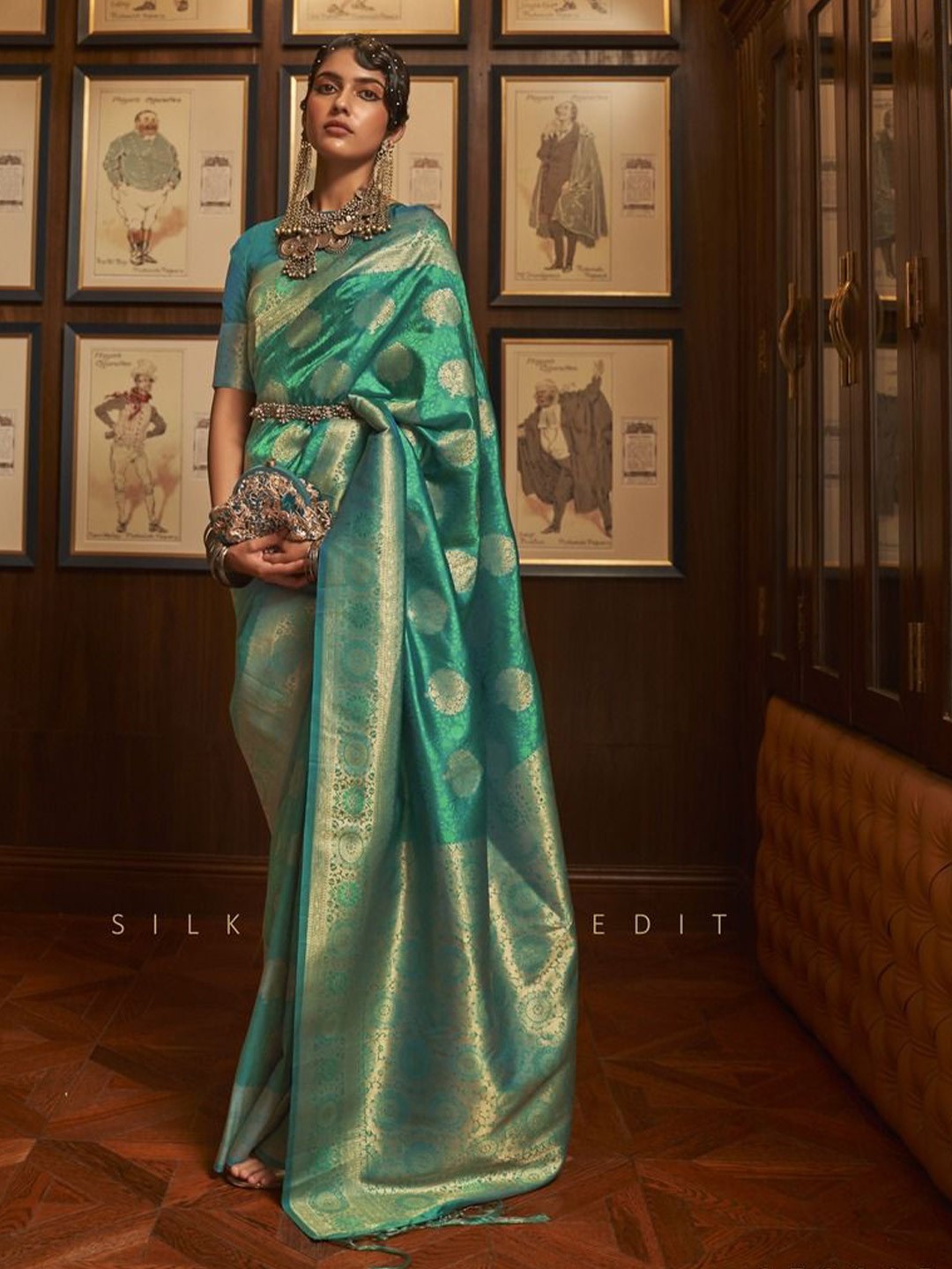 

Anouk Women Woven Design Zari Silk Banarasi Saree With An Unstitched Blouse Piece, Teal