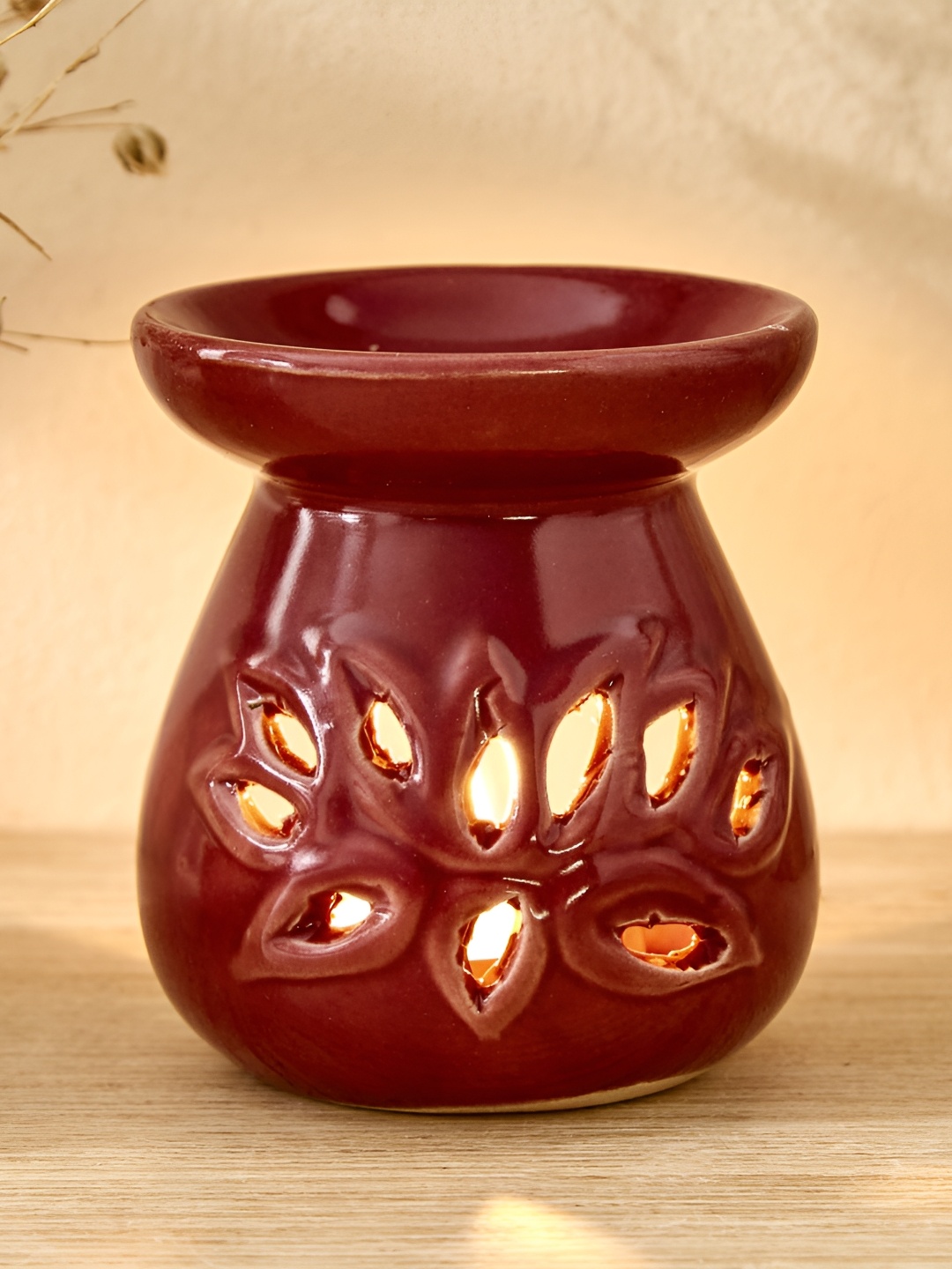 

Home Centre Red Ceramic Aroma Oil Diffusers