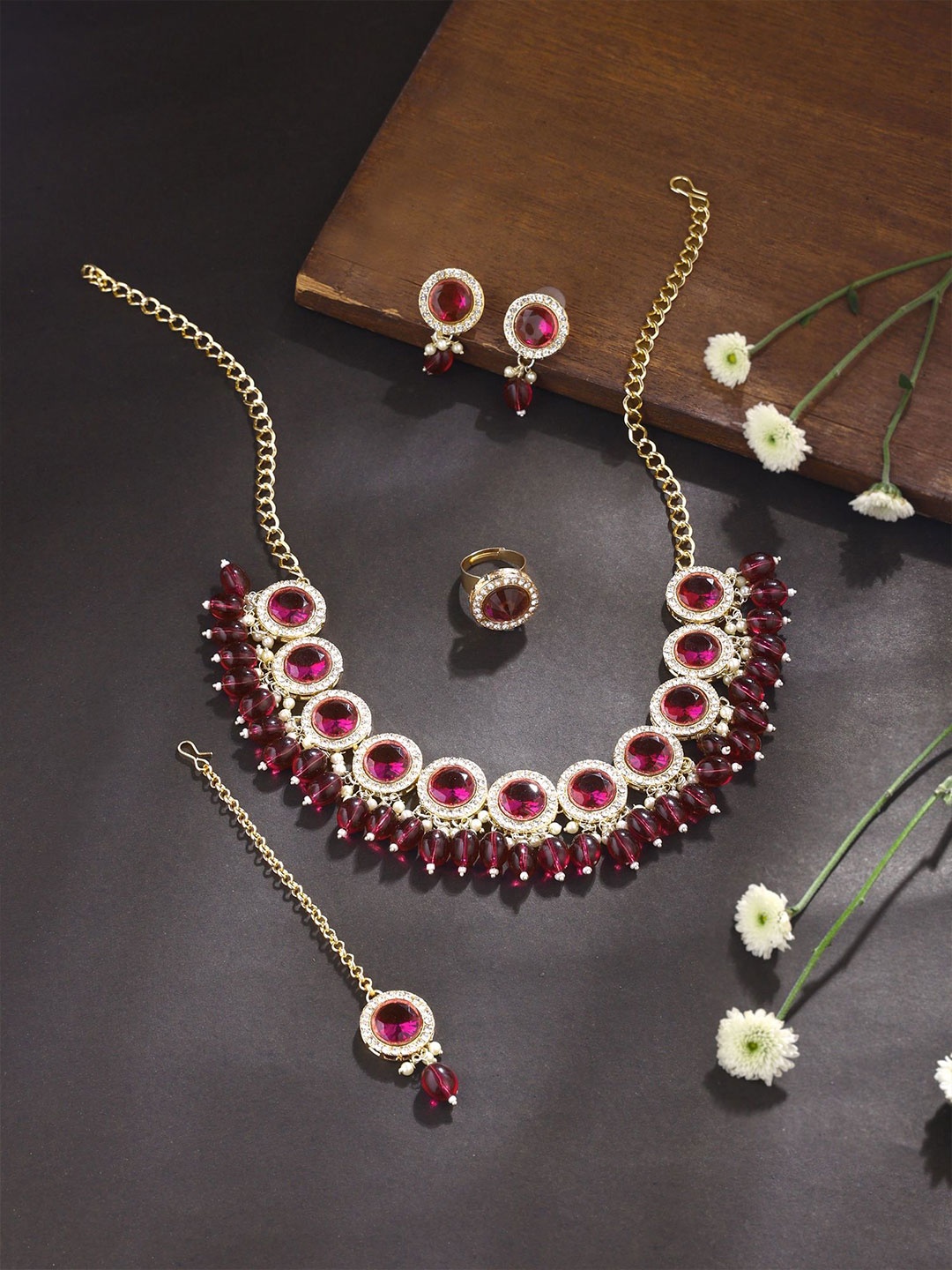 

Yellow Chimes Gold-Plated Stone Studded & Beaded Choker Jewellery Set