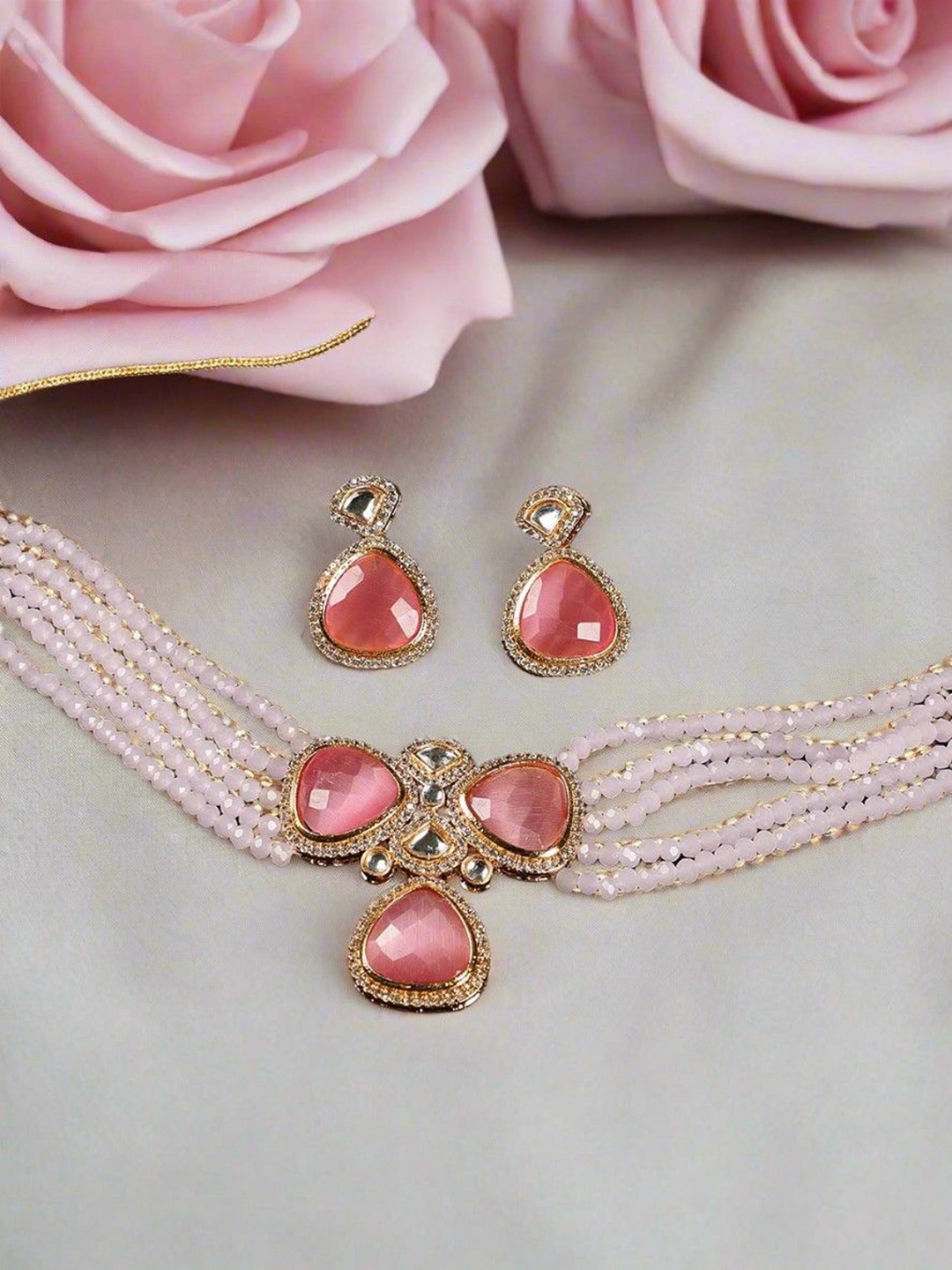 

Anouk Gold-Plated Kundan Stones-Studded & Beaded Jewellery Set