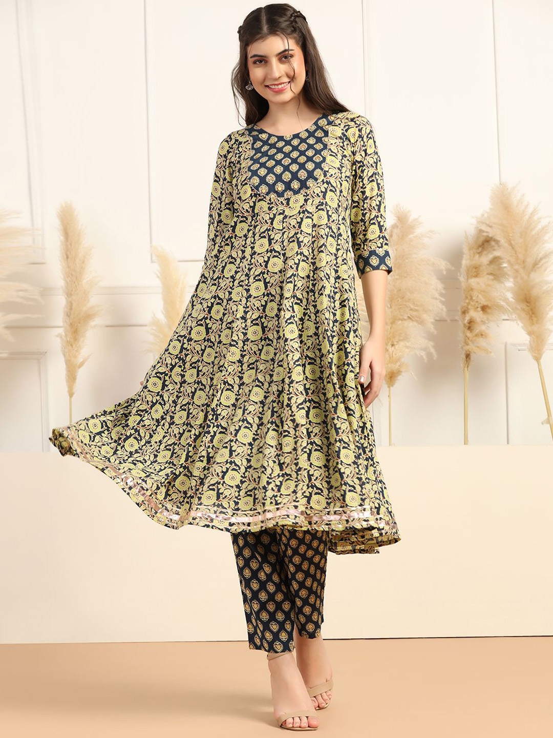 

Sangria Ethnic Motif Printed Round Neck Flared Kurta With Trousers, Navy blue