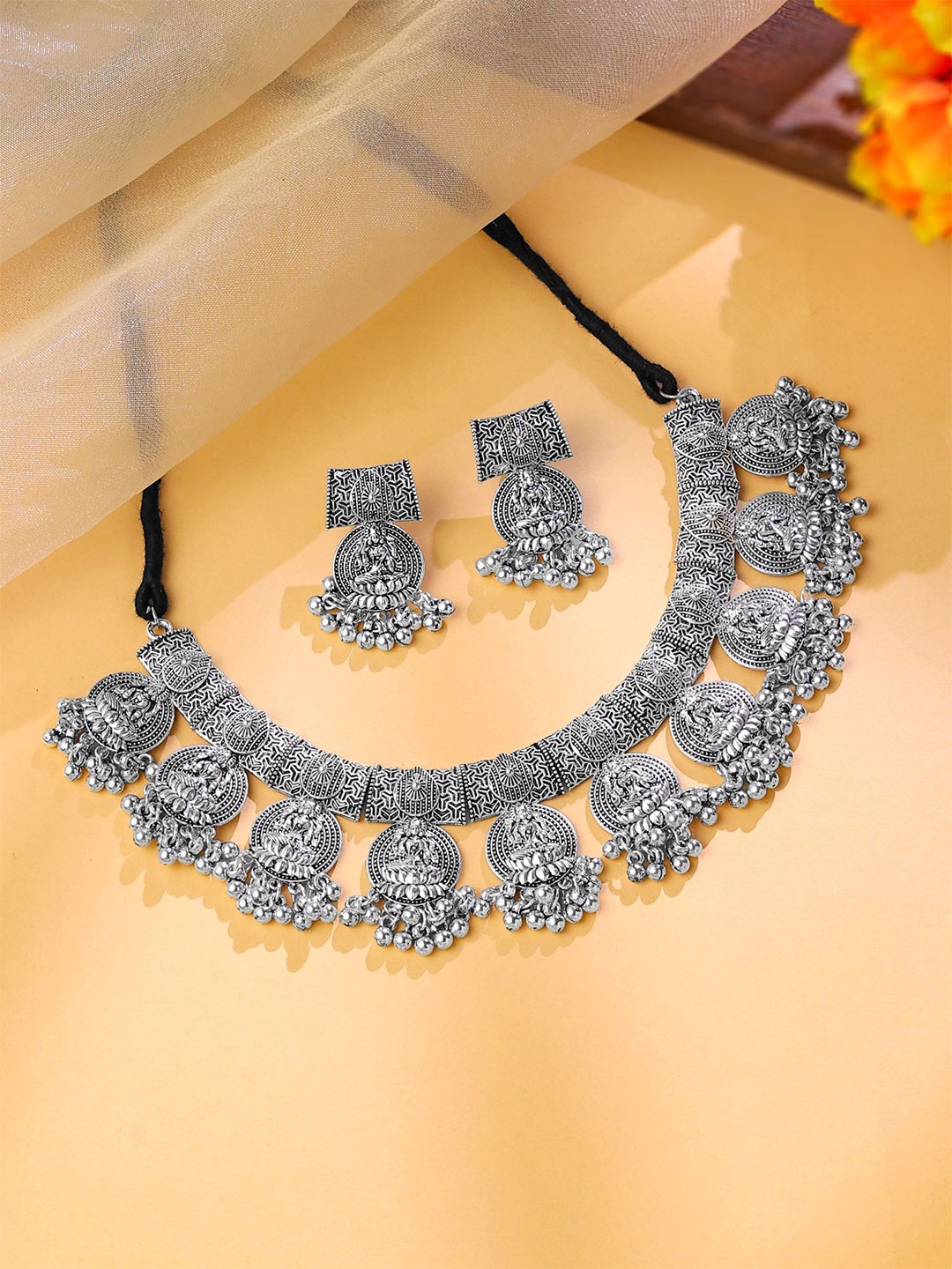 

Yellow Chimes Silver-Plated Oxidised Lakshmi Goddess Jewellery Set