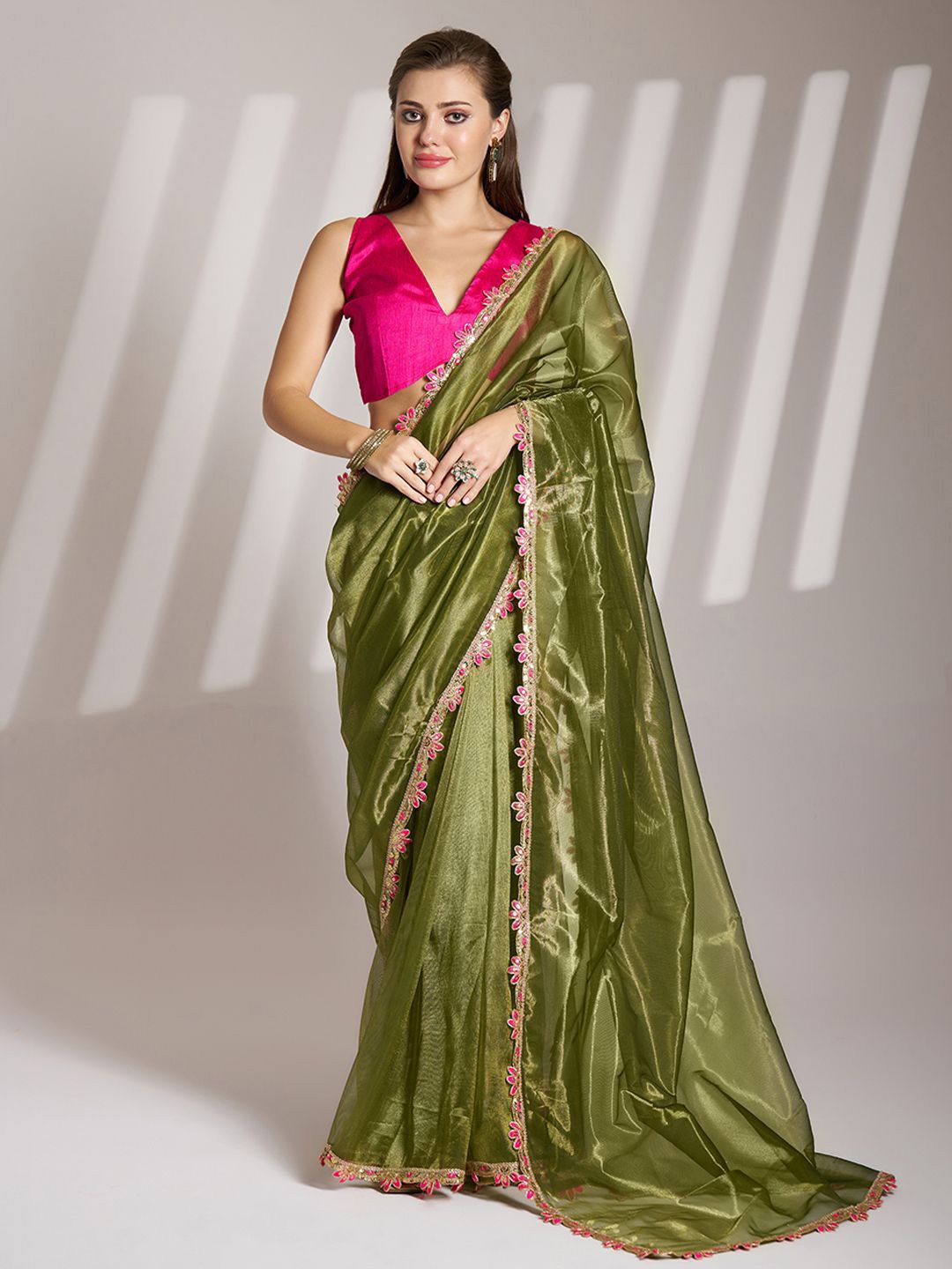 

Mitera Solid Green Sequinned Embellished Organza Saree