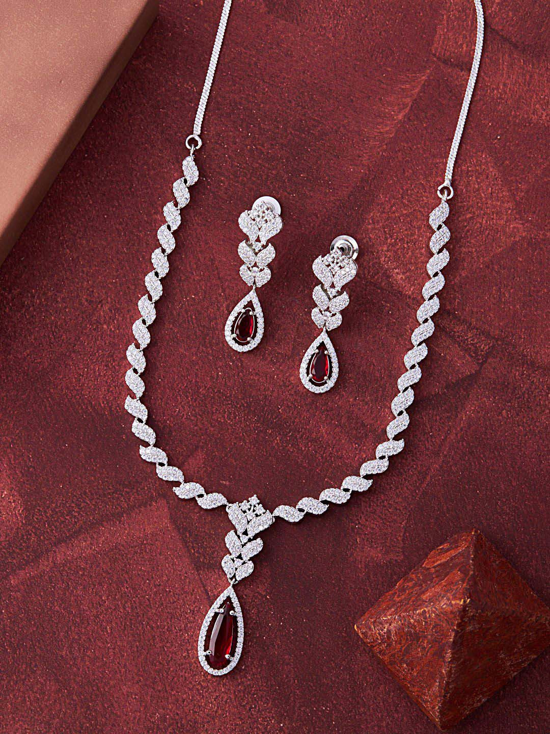 

Feelwhiz Silver-Plated American Diamond Studded Necklace and Earrings