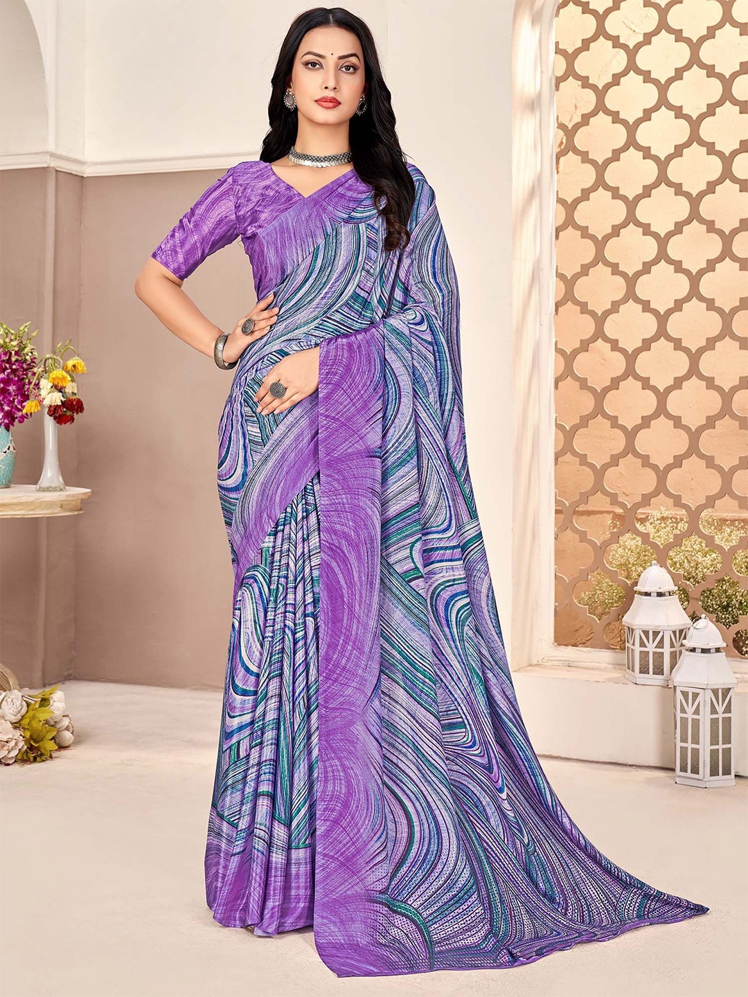 

Mitera Abstract Printed Sungudi Saree with an unstitched blouse piece, Purple