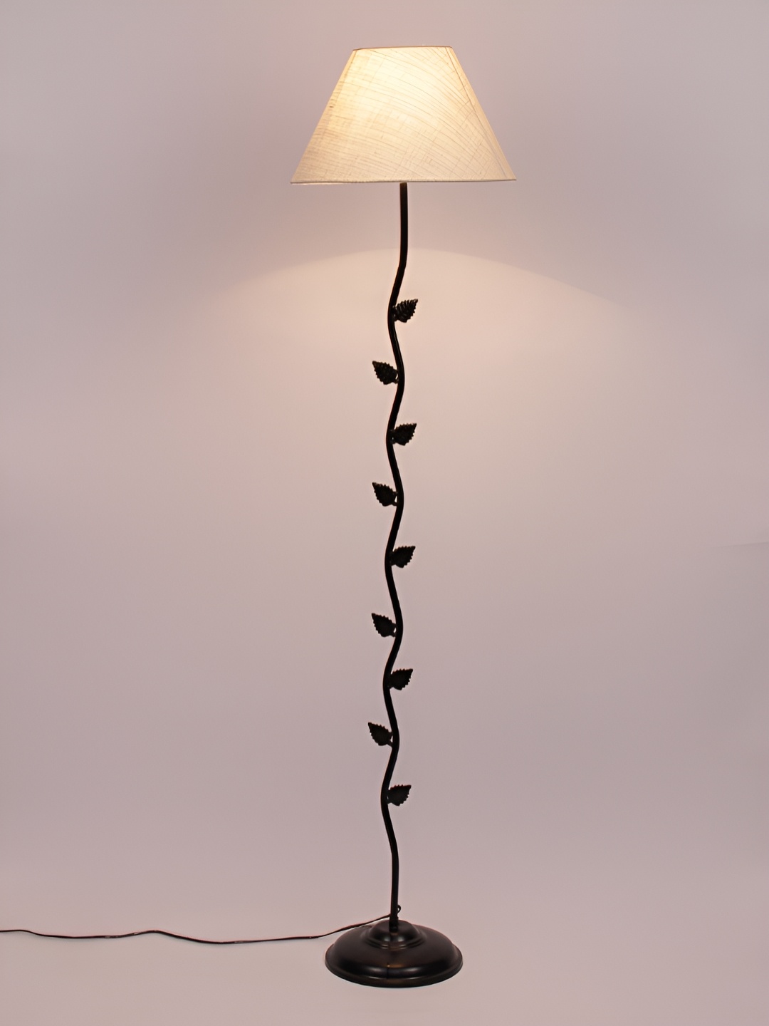 

Devansh Conical Black & White Frustum Leaf Floor Lamp With Jute Shade