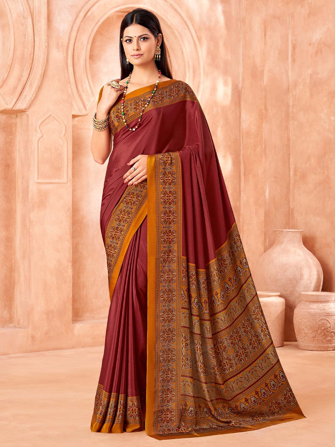 

Mitera Ethnic Motifs Printed Sungudi Saree, Maroon