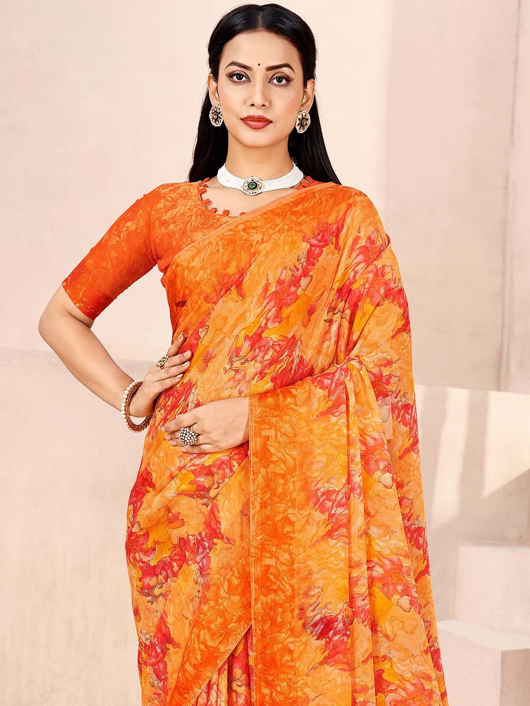 

Mitera Floral Printed Chiffon Bagru Saree With Unstitched Blouse Piece, Orange
