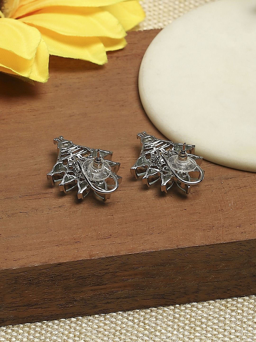 

Biba Silver-Plated Artificial Stones Studded Floral Shaped Studs