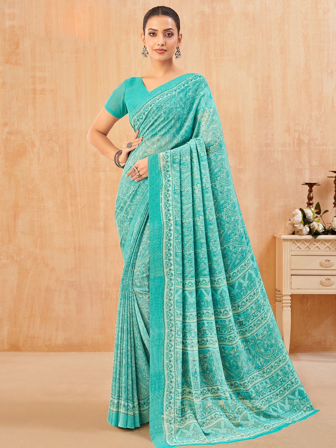 

Anouk Rustic Paisley Printed Dabu Saree, Turquoise blue