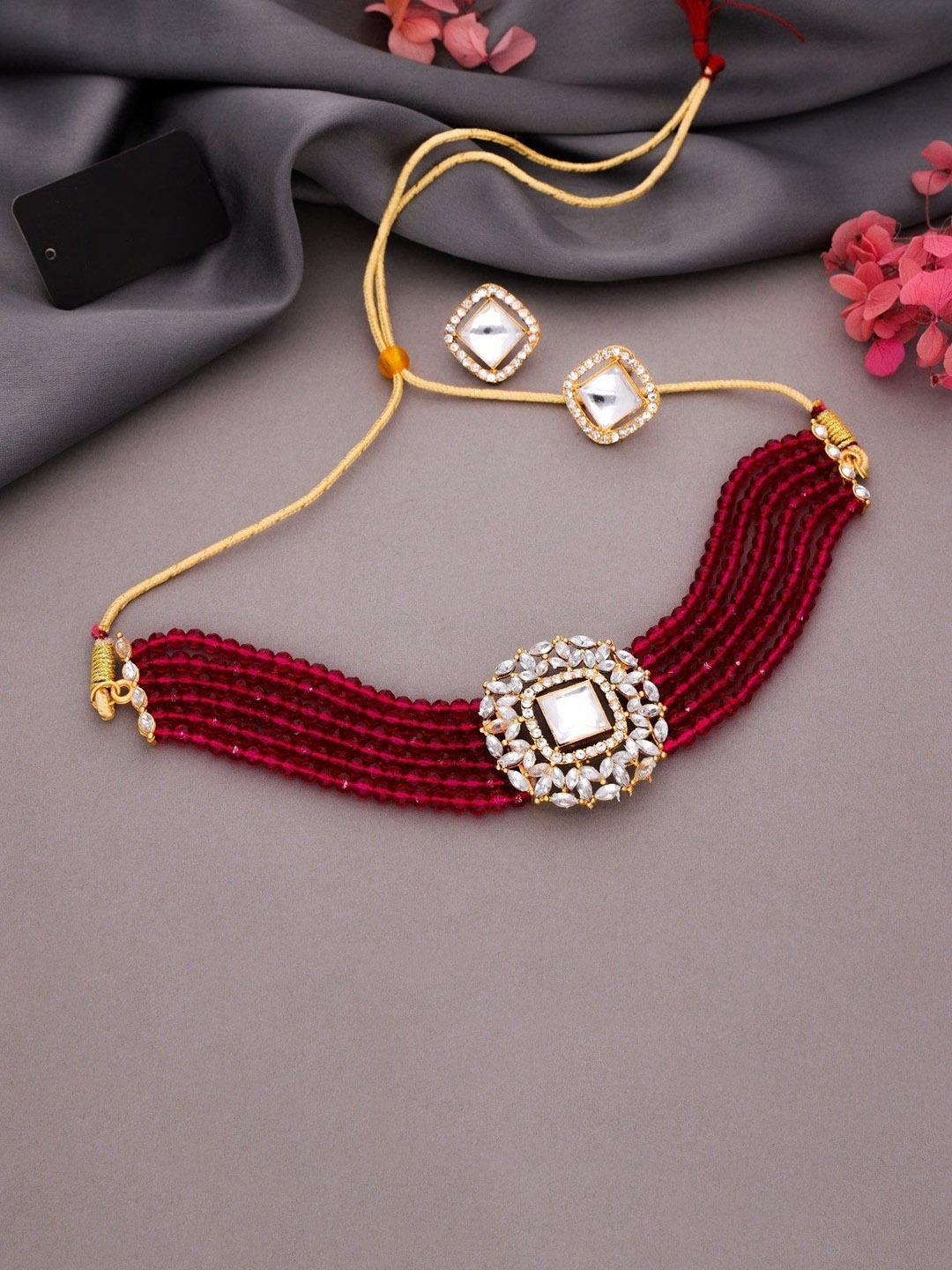 

Anouk Gold-Plated American Diamonds Studded & Beaded Jewellery Set