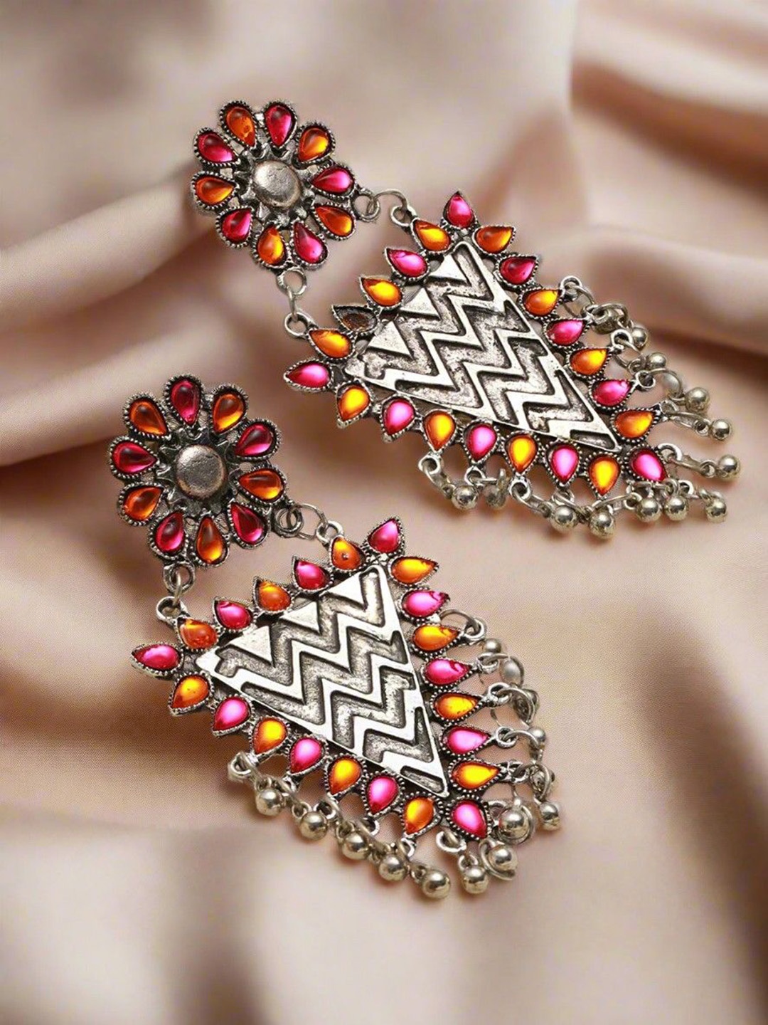 

Sangria German Silver Plated Stones Studded & Ghugroo Floral Shaped Oxidised Drop Earrings