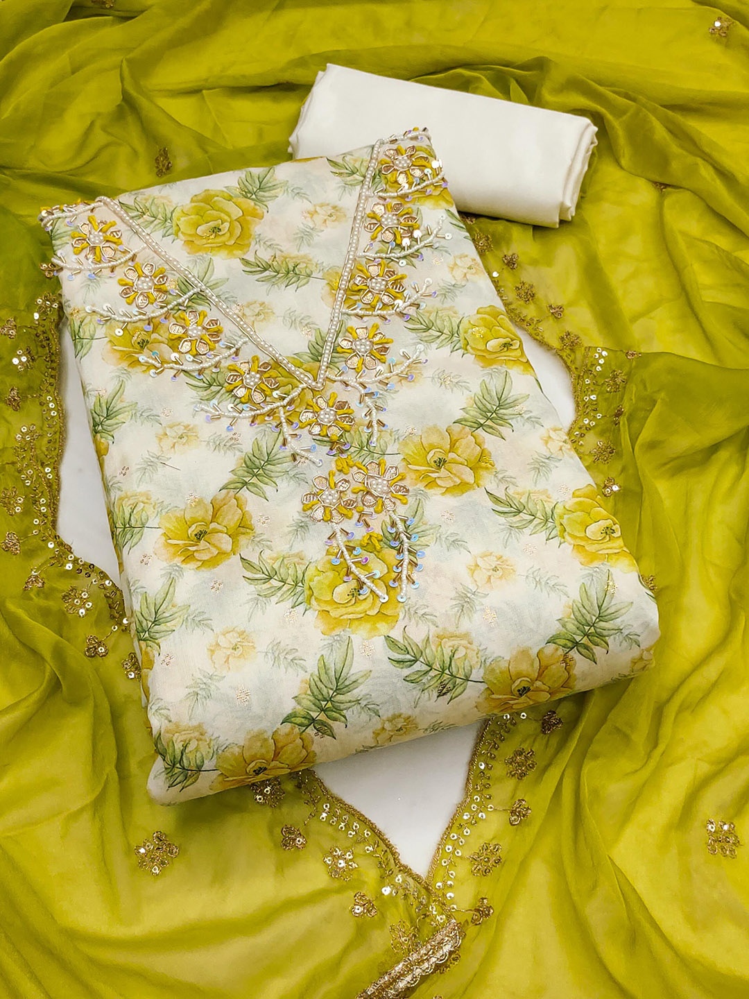 

SAINOOR Floral Embellished Zari Work Semi-Stitched Dress Material, Yellow